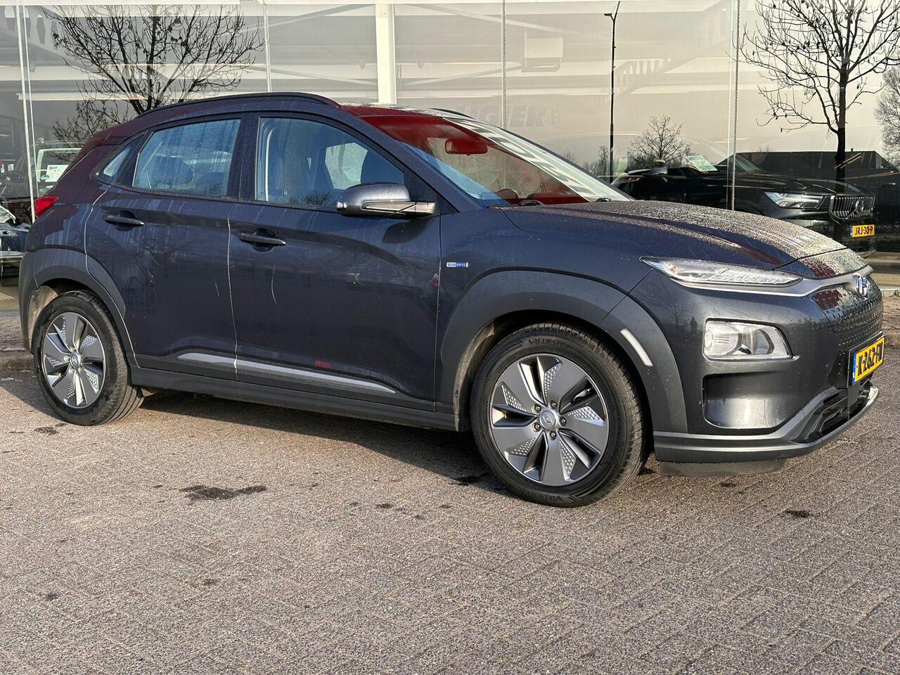 Hyundai Kona EV Comfort 64 kWh | SOH: 96,4% | 3 Fase |Warmtepomp | Navi | Adaptive CC | Climate |