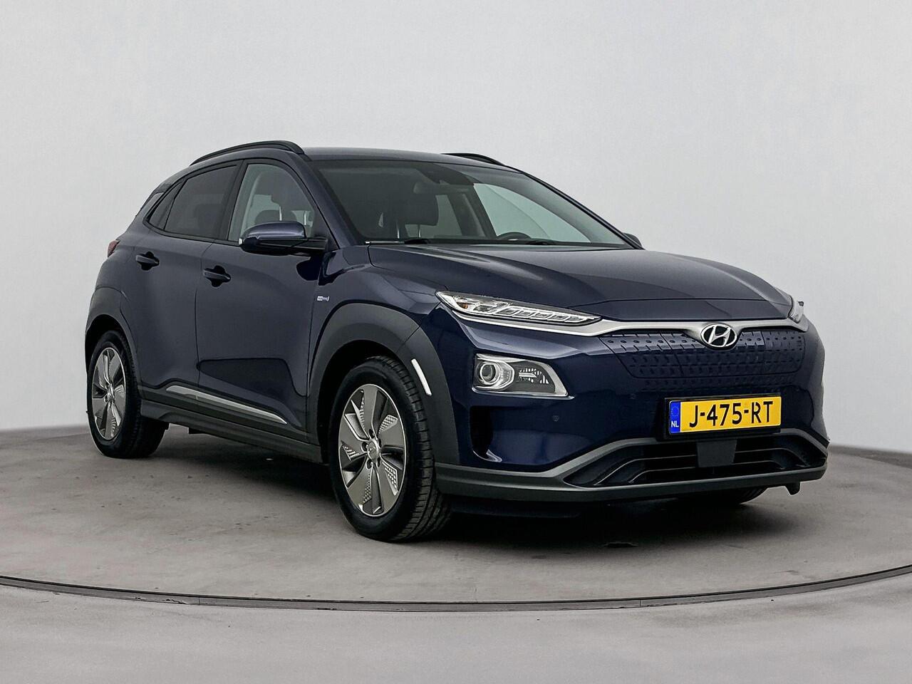 Hyundai Kona EV Premium 64 kWh | Soh 96,5 % | Navigatie, Apple car play Android auto| stoel verwarming en koeling |