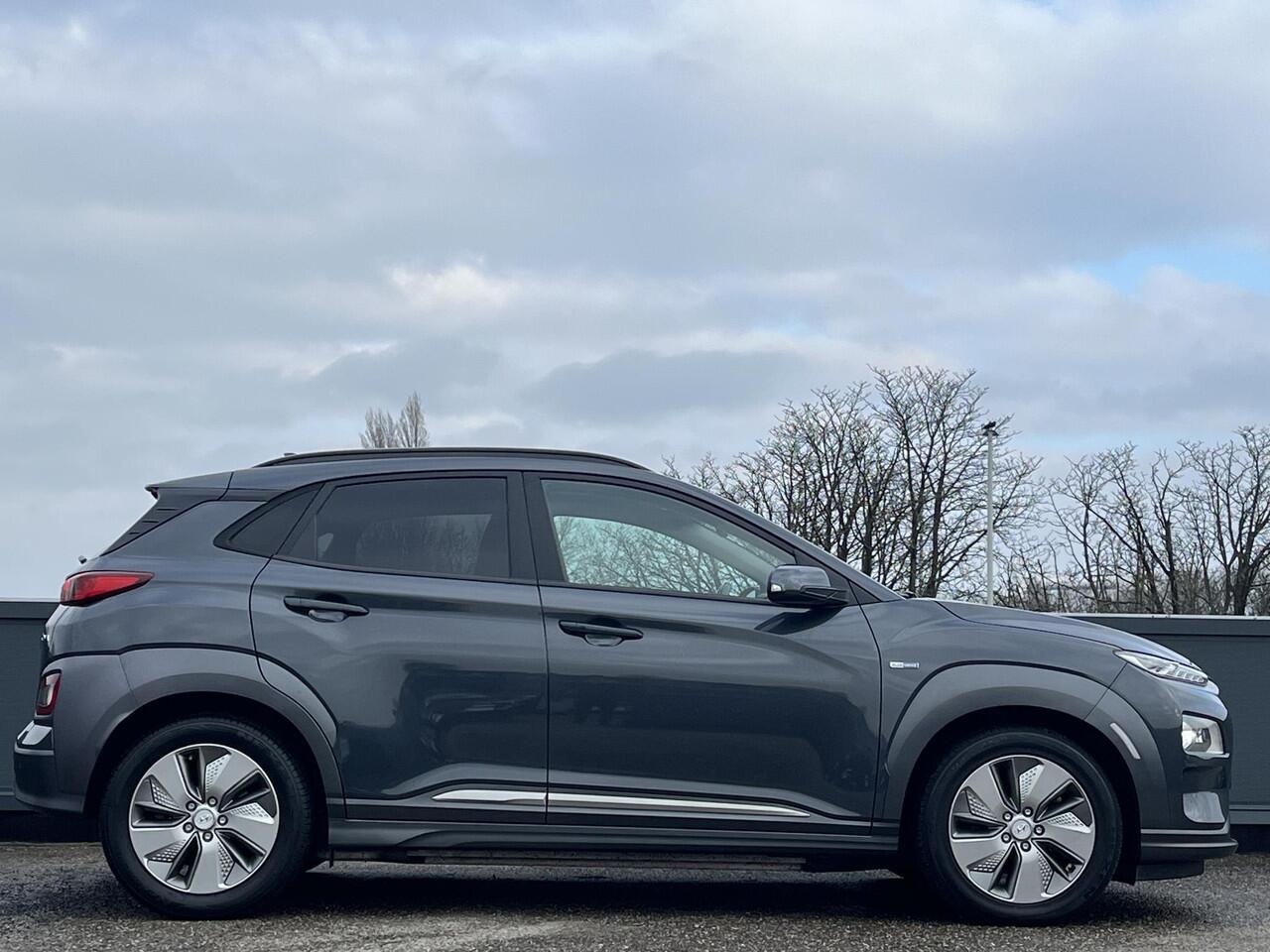 Hyundai Kona EV Premium 64kWh 204pk | SCHUIF/KANTELDAK | LEDER | HEAD UP DISPLAY | ADAPTIEVE CRUISE | NAVI | APPLE CARPLAY / ANDROID AUTO |