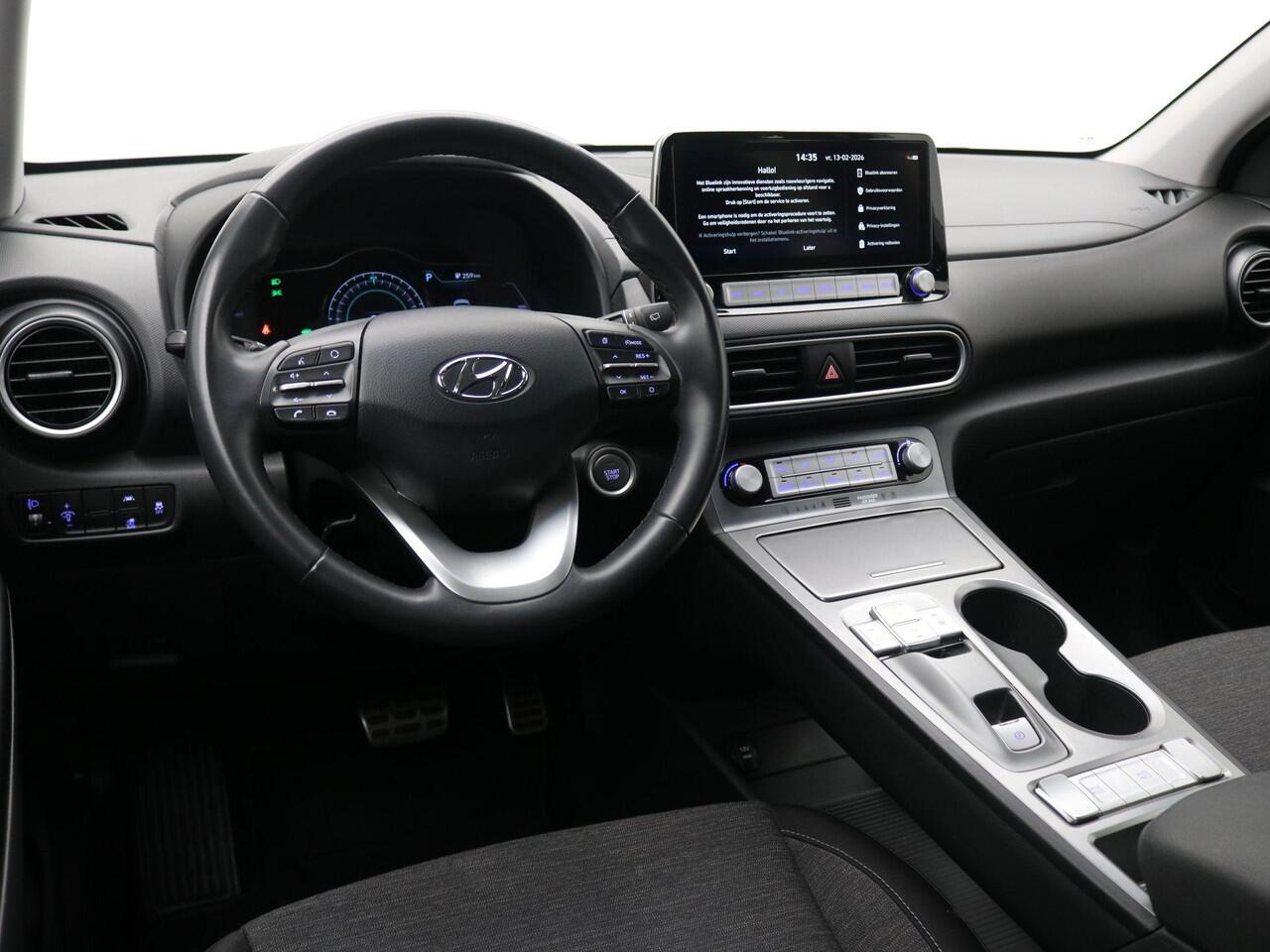 Hyundai Kona EV Fashion 64 kWh / 482 KM WLTP / SOH 99,1% / Cruise Control / Climate Control / Achteruitrijcamera / Navigatie / Apple Carplay / Dealeronderhouden /