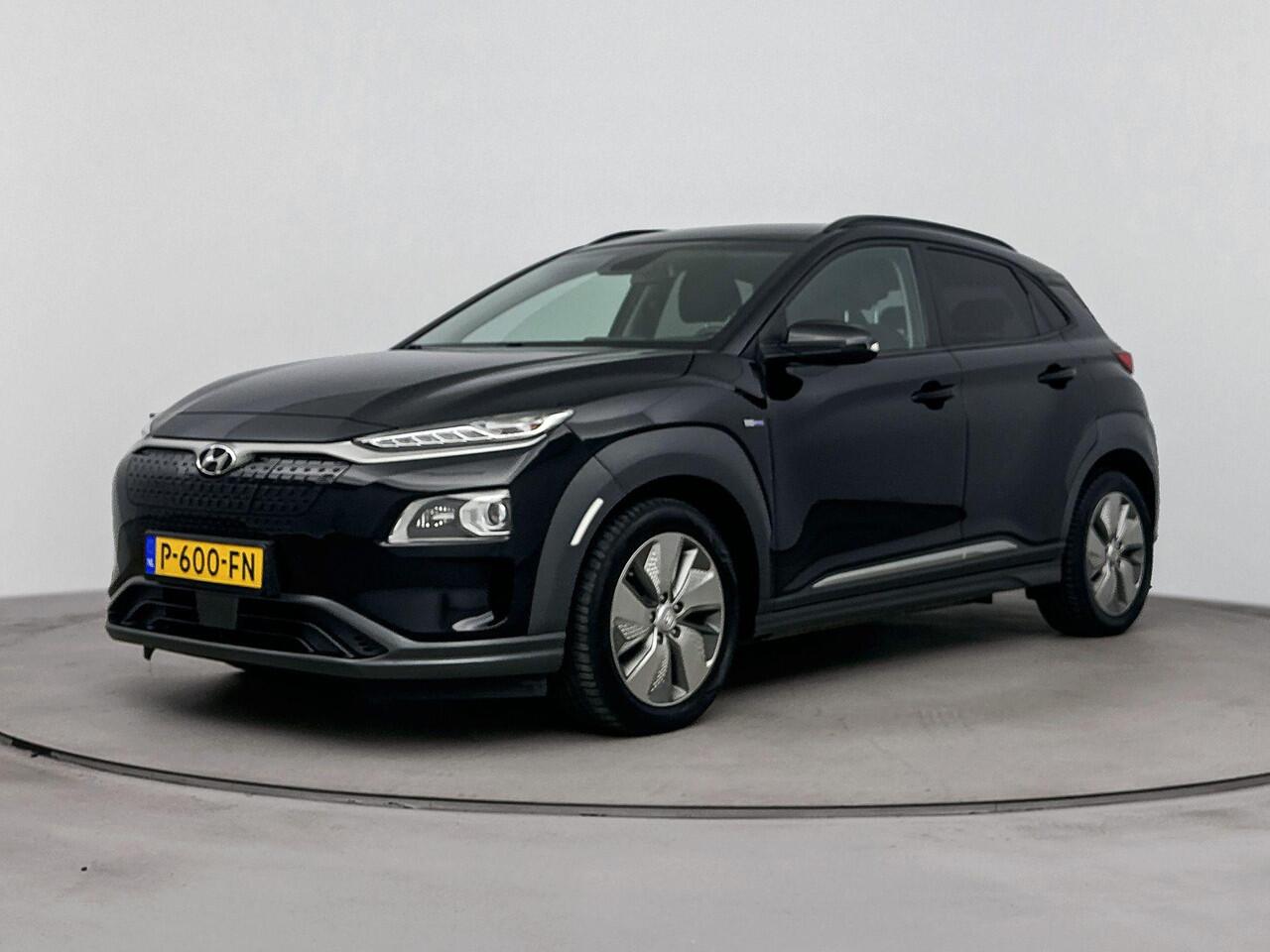 Hyundai Kona EV Comfort Smart 64 kWh | Navigatie met Apple Carplay/Android Auto | Warmtepomp | Stoel en stuurwiel verwarming | climate control | Soh 95,3% |