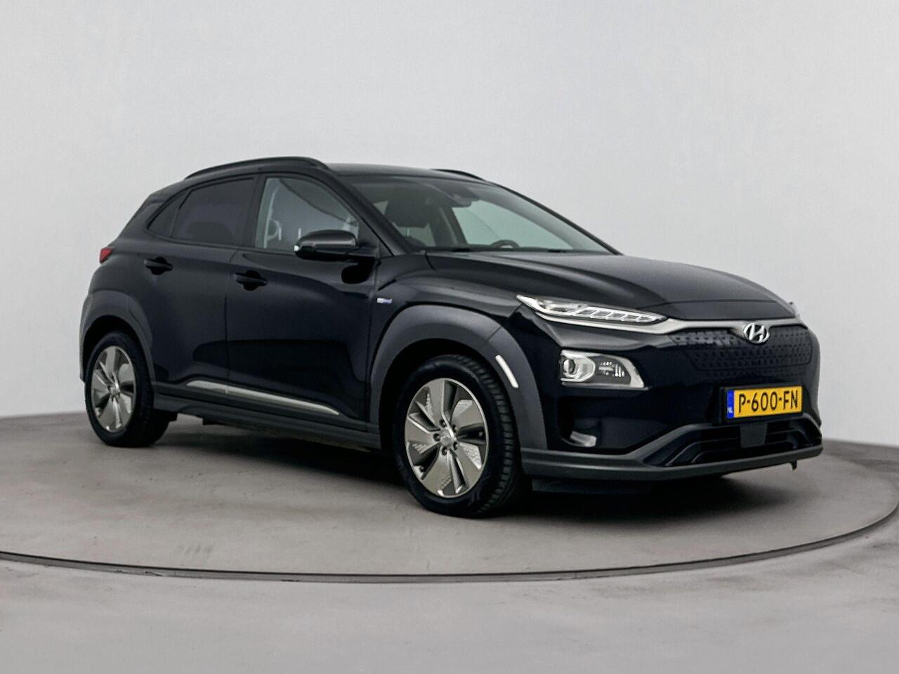 Hyundai Kona EV Comfort Smart 64 kWh | Navigatie met Apple Carplay/Android Auto | Warmtepomp | Stoel en stuurwiel verwarming | climate control | Soh 95,3% |