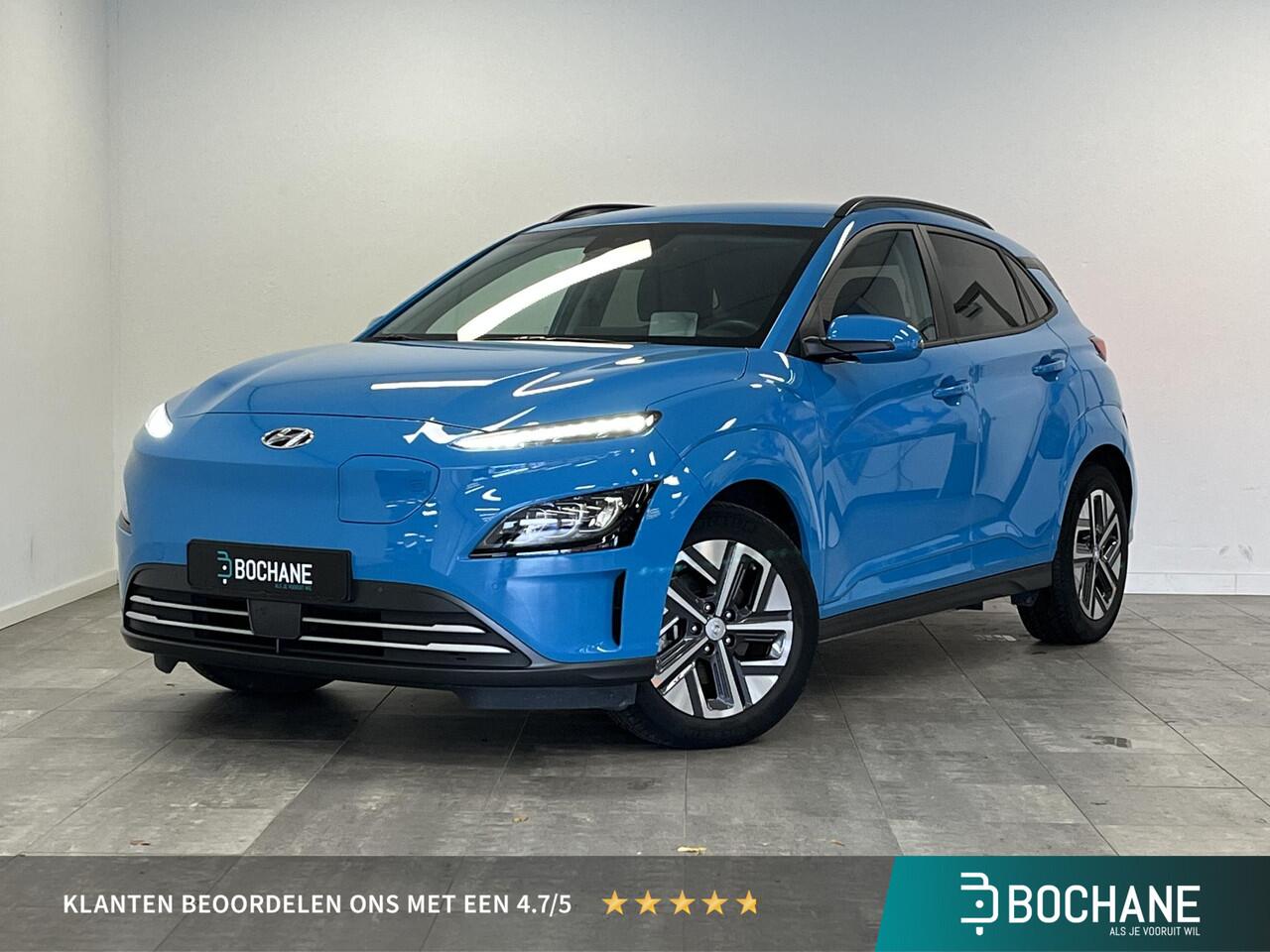 Hyundai Kona EV Premium 64 kWh | soH 97,6% | elektrische stoelen | dodehoek detectie | adaptive cruise control