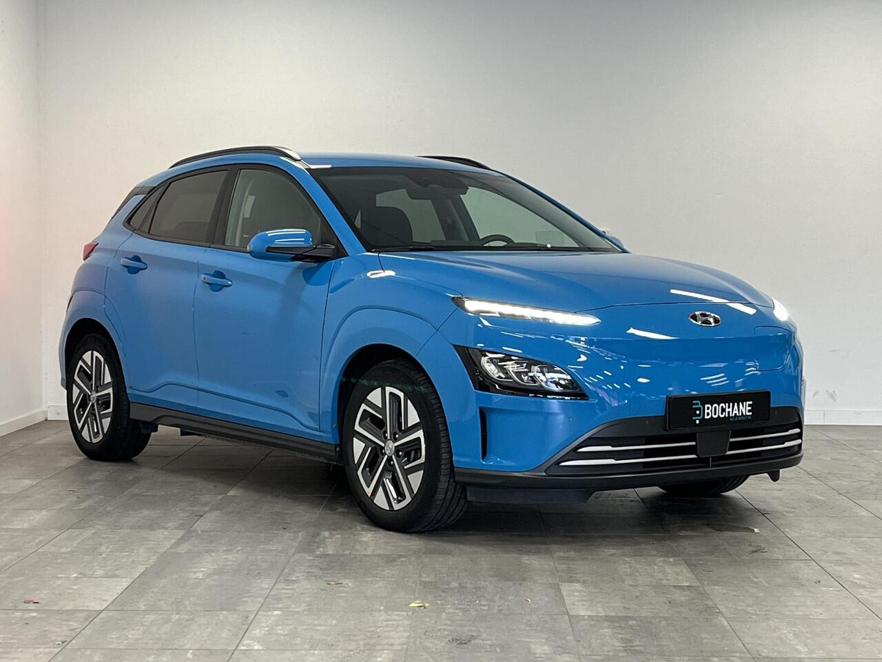Hyundai Kona EV Premium 64 kWh | soH 97,6% | elektrische stoelen | dodehoek detectie | adaptive cruise control