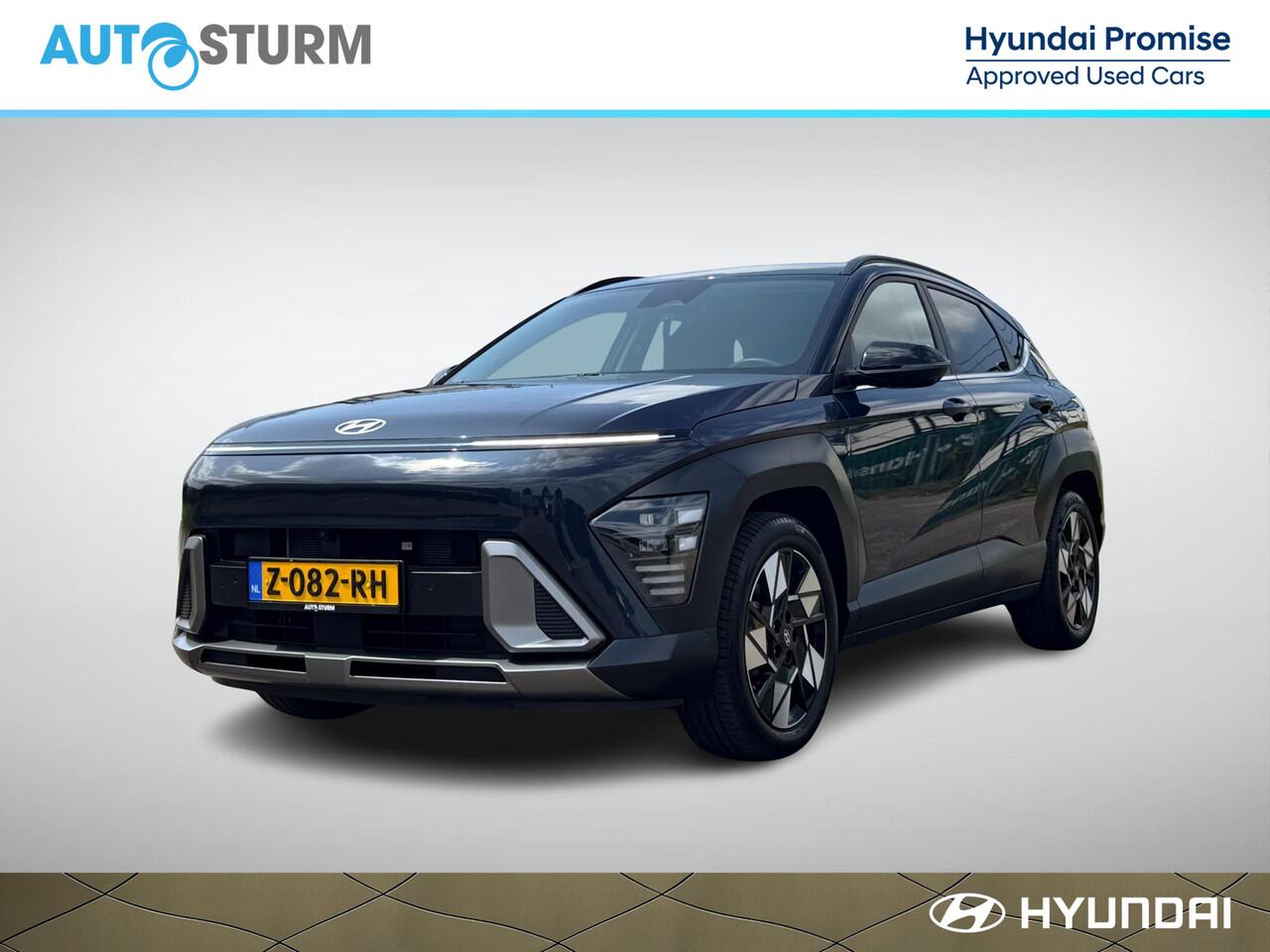 Hyundai Kona 1.6 GDI HEV Premium | Two-Tone Lakkleur | Stoelverwarming + -Ventilatie | 360° Camera | Leder | Navigatie | Apple Carplay/Android Auto | Geheugenstoel | Rijklaarprijs!