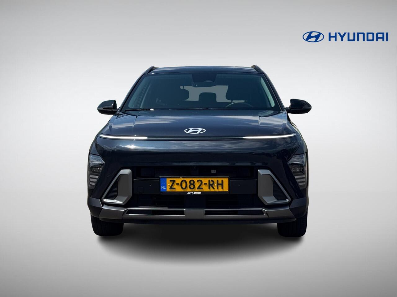 Hyundai Kona 1.6 GDI HEV Premium | Two-Tone Lakkleur | Stoelverwarming + -Ventilatie | 360° Camera | Leder | Navigatie | Apple Carplay/Android Auto | Geheugenstoel | Rijklaarprijs!