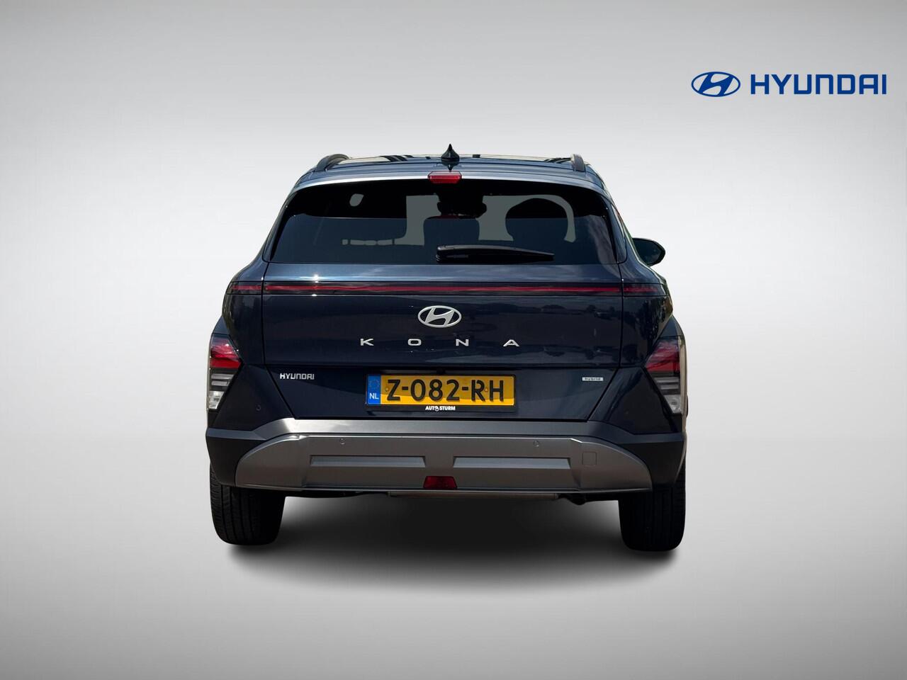 Hyundai Kona 1.6 GDI HEV Premium | Two-Tone Lakkleur | Stoelverwarming + -Ventilatie | 360° Camera | Leder | Navigatie | Apple Carplay/Android Auto | Geheugenstoel | Rijklaarprijs!