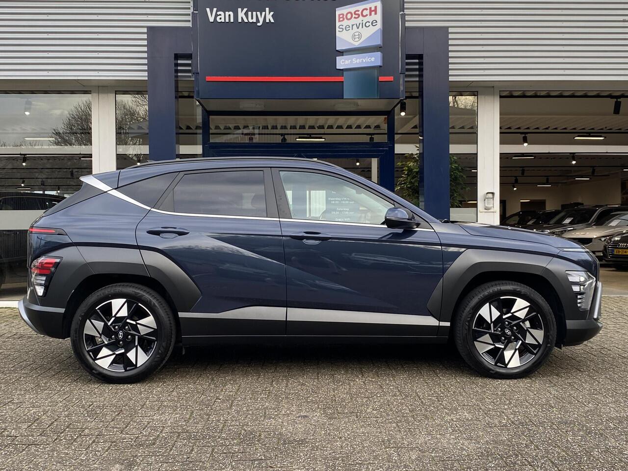 Hyundai Kona 1.6 GDI HEV Comfort Smart / Automaat / NL-Auto / 1e-Eigenaar / 18.000 Km / Fabrieksgarantie / Keyless / Digitaal Dashboard / LED / DAB / Apple-Carplay&Android-Auto / Navi / Camera / Stuur+Stoelverwarming / Adaptieve Cruise-Control / Lane-Assist / E-Achter
