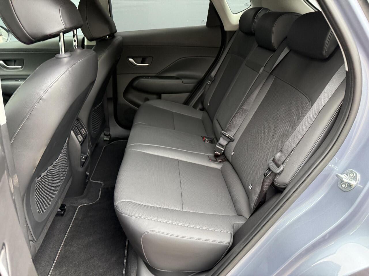 Hyundai Kona Electric Premium 65.4 kWh / Elektrische stoelen met geheugen / Stoel verkoeling+verwarming / 360º Camera / Keyless / Elektrische Achterklep / Apple carplay&Android auto /