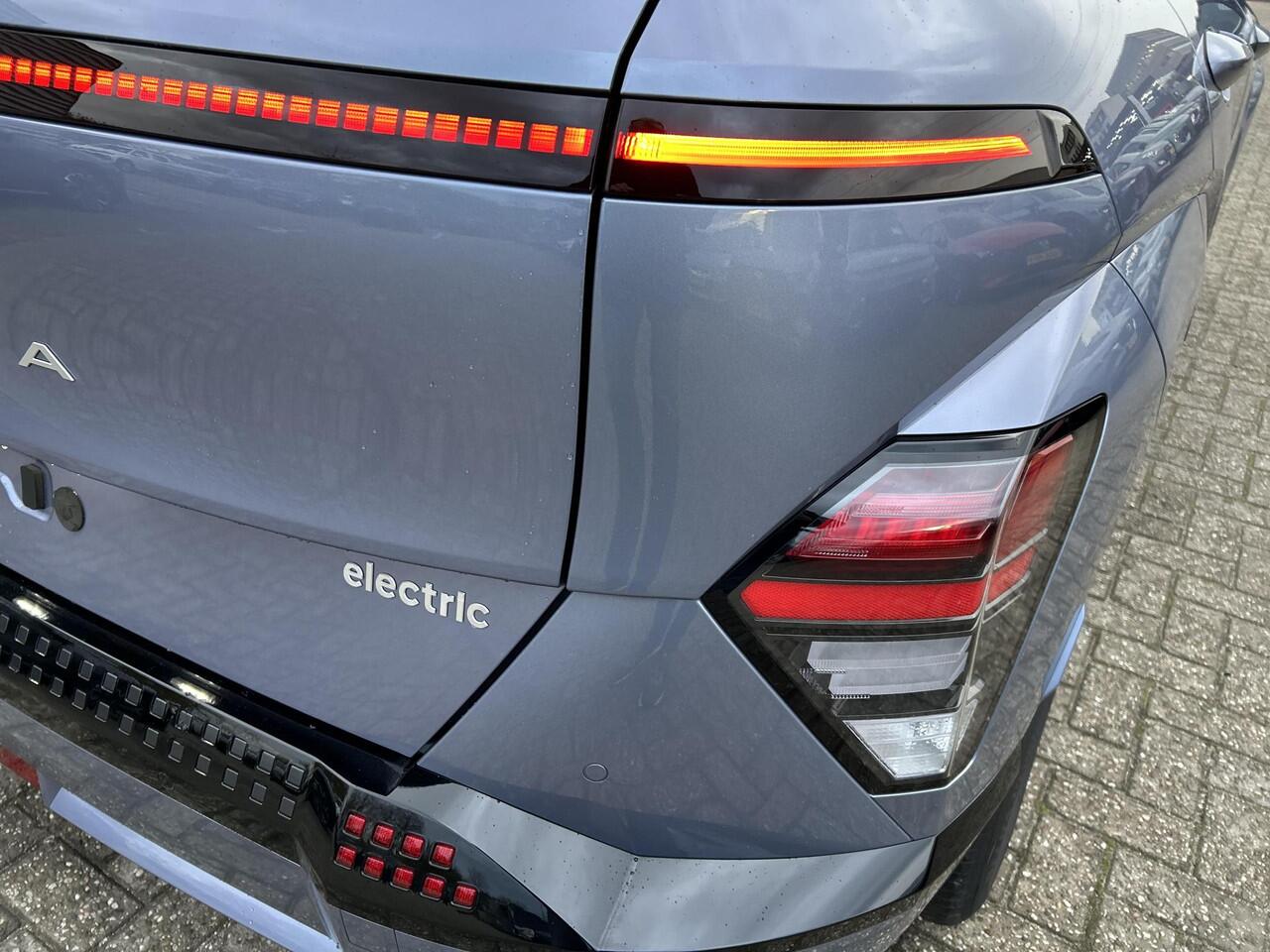Hyundai Kona Electric Comfort Smart 65.4 kWh | 7500,= Korting! | Climate / Cruise Control | Navigatiesysteem | Achteruitrijcamera | Apple Carplay | DAB+ |