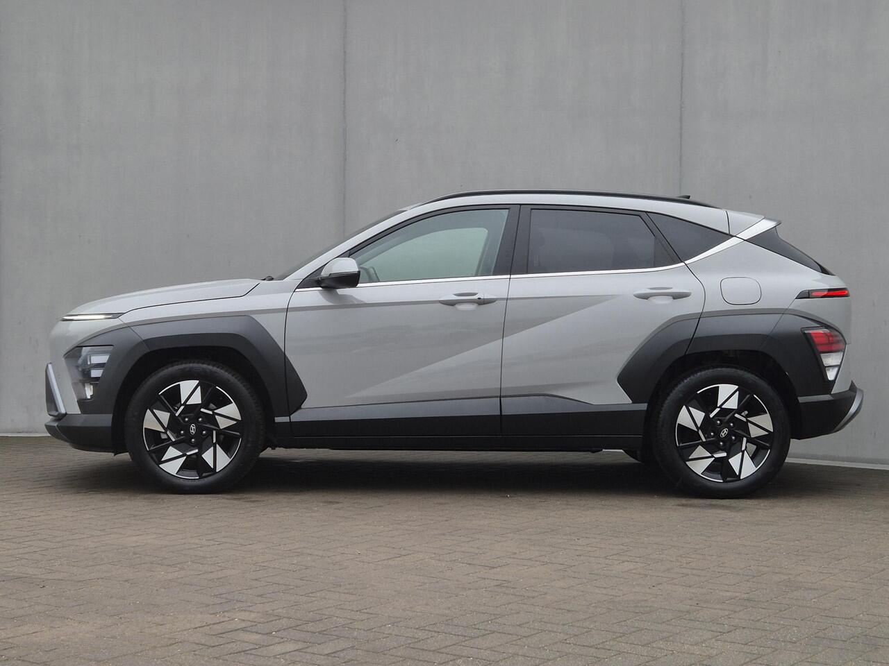 Hyundai Kona 1.6 GDI HEV Comfort Smart Automaat / Stuur- & Stoel verwarming / Achteruitrijcamera / Apple Carplay Android Auto / Keyless Entry/Start / Adaptief cruise control / Draadloze telefoon lader / Climate control /