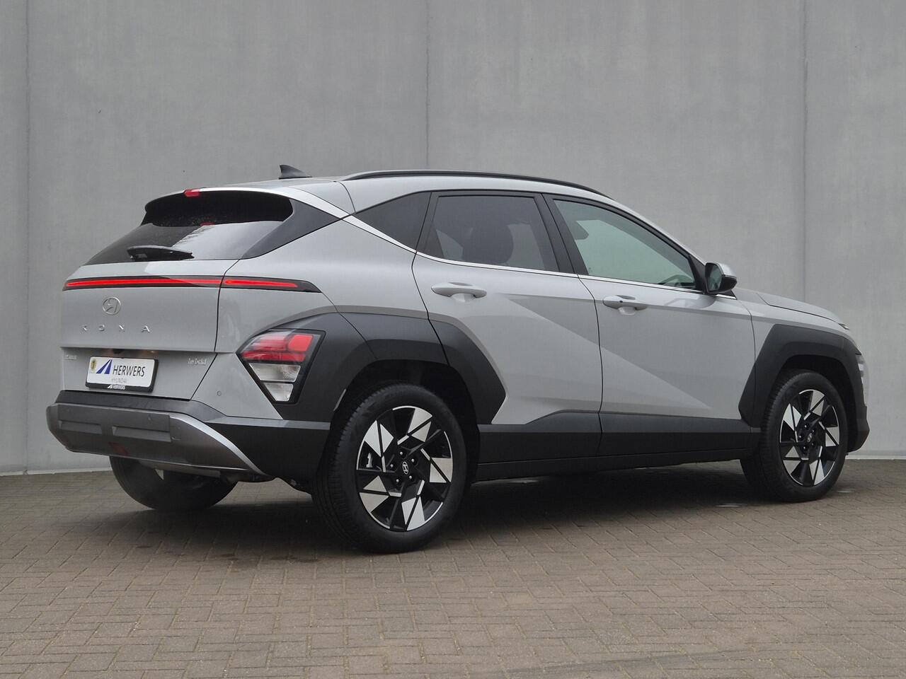 Hyundai Kona 1.6 GDI HEV Comfort Smart Automaat / Stuur- & Stoel verwarming / Achteruitrijcamera / Apple Carplay Android Auto / Keyless Entry/Start / Adaptief cruise control / Draadloze telefoon lader / Climate control /