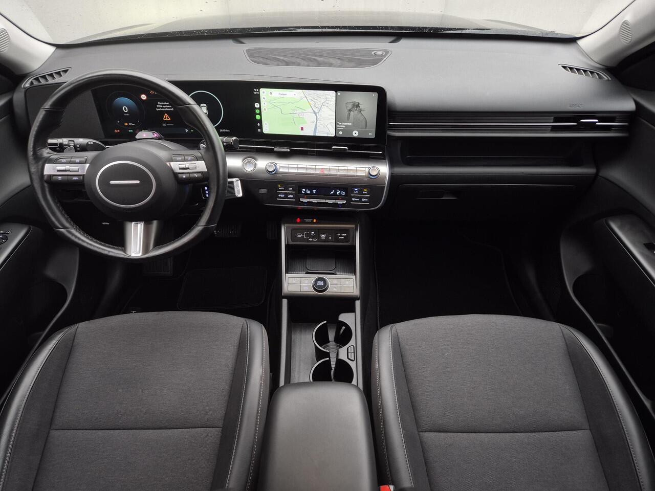 Hyundai Kona 1.6 GDI HEV Comfort Smart Automaat / Fabrieksgarantie tot 2-2030 / Stuur- & Stoelverwarming / Adaptief cruise control / Achteruitrijcamera / Climate control / Keyless Entry/Start / Apple Carplay Android Auto / Navigatie / Parkeersensoren voor en achter /
