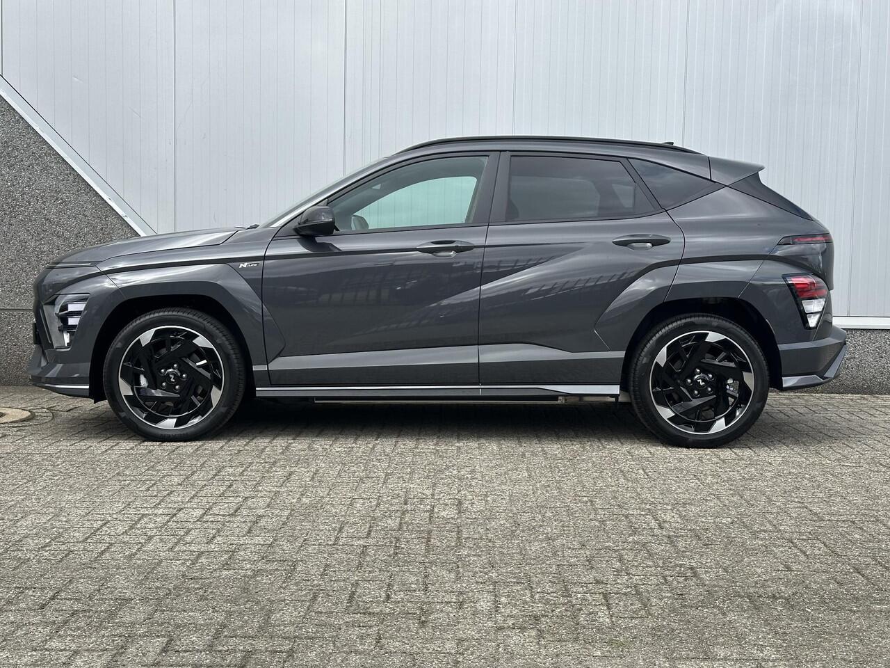 Hyundai Kona Electric N Line Business 64.8 kWh ** Nu met gratis Trekhaak of All-season banden + ¤ 2.500 Voordeel ** Nieuw uit voorraad leverbaar ** / Snel Leverbaar / Navigatie / Cruise Control Adaptief / Airco Automatisch /