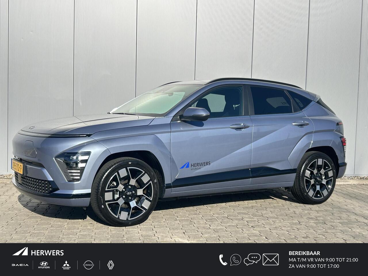 Hyundai Kona Electric Comfort Smart 65.4 kWh / Navigatie / Cruise Control Adaptief / Climate Control / Achterklep Elektrisch / Stoel & Stuurwiel Verwarming Voorzijde /