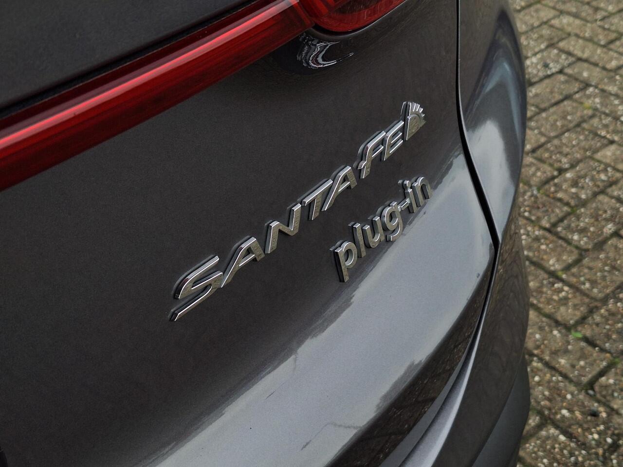 Hyundai SANTA FE 1.6 T-GDI PHEV Premium SKY 7p. | Apple Carplay/Android Auto | Stoel/stuurverwarming | Draadloze telefoon oplader | Elektrische achterklep | Elektrische verstelbare stoelen met geheugen |