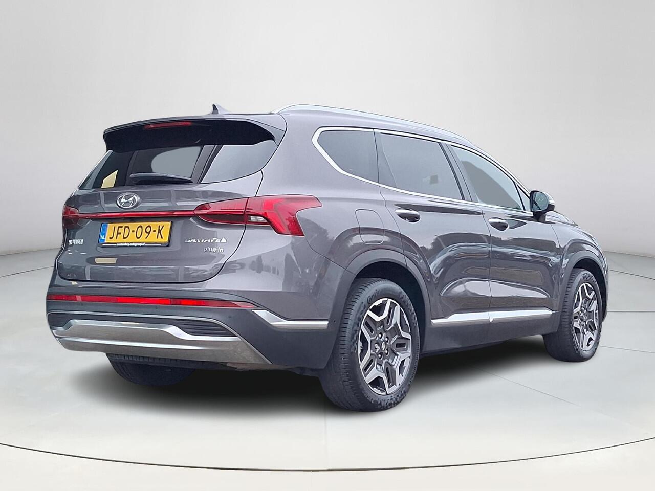 Hyundai SANTA FE 1.6 T-GDI PHEV Premium SKY 7p. | Apple Carplay/Android Auto | Stoel/stuurverwarming | Draadloze telefoon oplader | Elektrische achterklep | Elektrische verstelbare stoelen met geheugen |