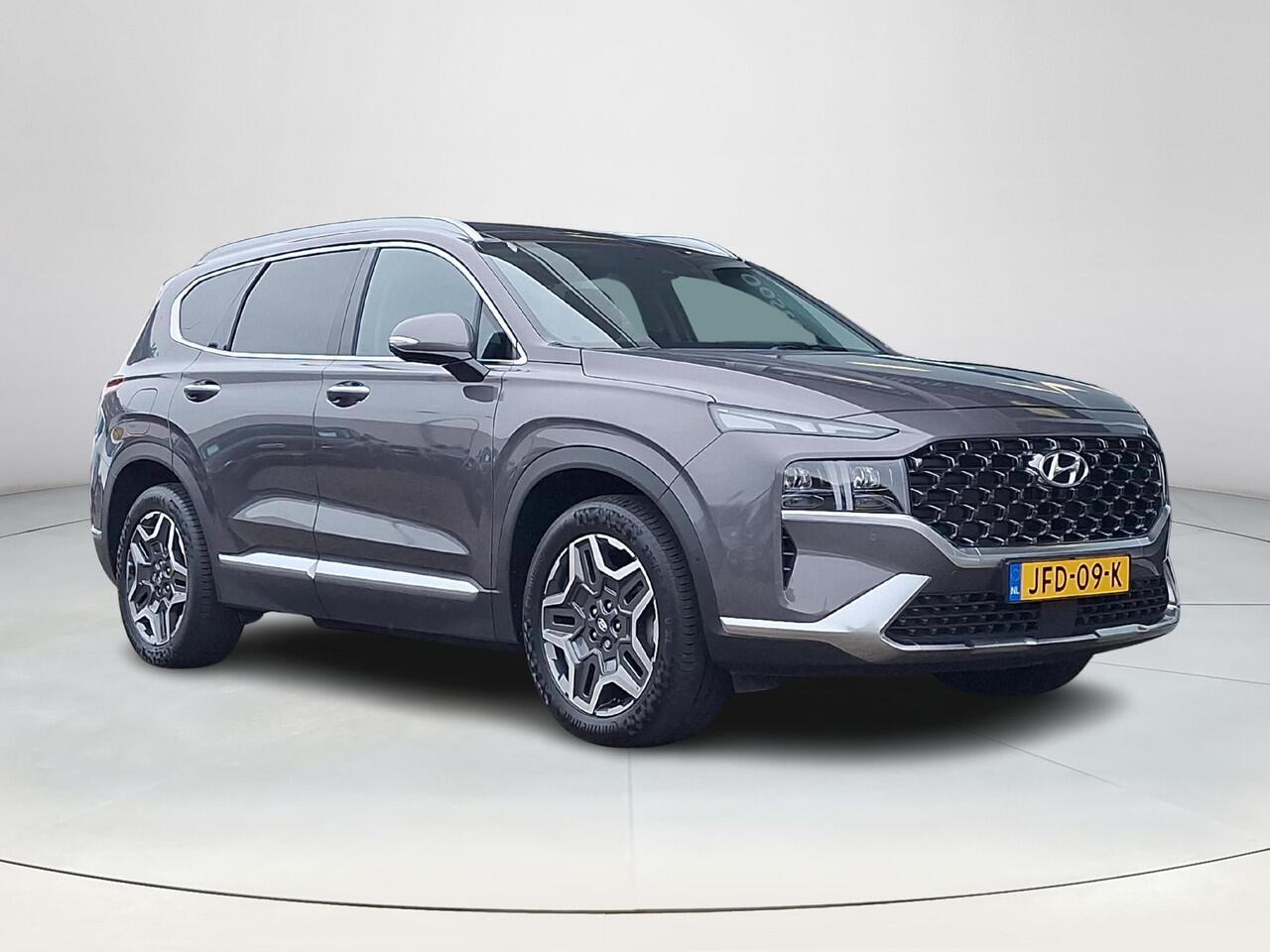 Hyundai SANTA FE 1.6 T-GDI PHEV Premium SKY 7p. | Apple Carplay/Android Auto | Stoel/stuurverwarming | Draadloze telefoon oplader | Elektrische achterklep | Elektrische verstelbare stoelen met geheugen |