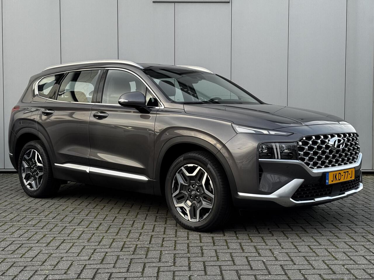 Hyundai SANTA FE 1.6 T-GDI PHEV Plug-in Premium Automaat / AWD / Fabrieksgarantie tot 1/7/2027 / Dealer onderhouden / EAER 58km / Apple Carplay Android Auto / Adaptief CC / Achteruitrijcamera / Stuur- Stoel en Achterbankverwarming / Elektrische achterklep / Trekgewicht 1