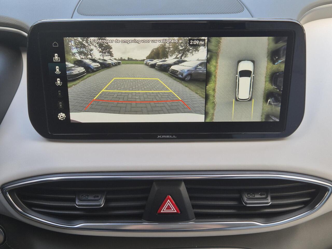 Hyundai SANTA FE 1.6 T-GDI HEV Premium Plus Sky 7p. Automaat / NL Auto / HUD / 7 Persoons / Allseason banden / Trekgewicht 1650 Kg / Stuur-, Stoel en Achterbankverwarming / Elektrische achterklep / Glazen schuif- en kanteldak / Stoelventilatie /