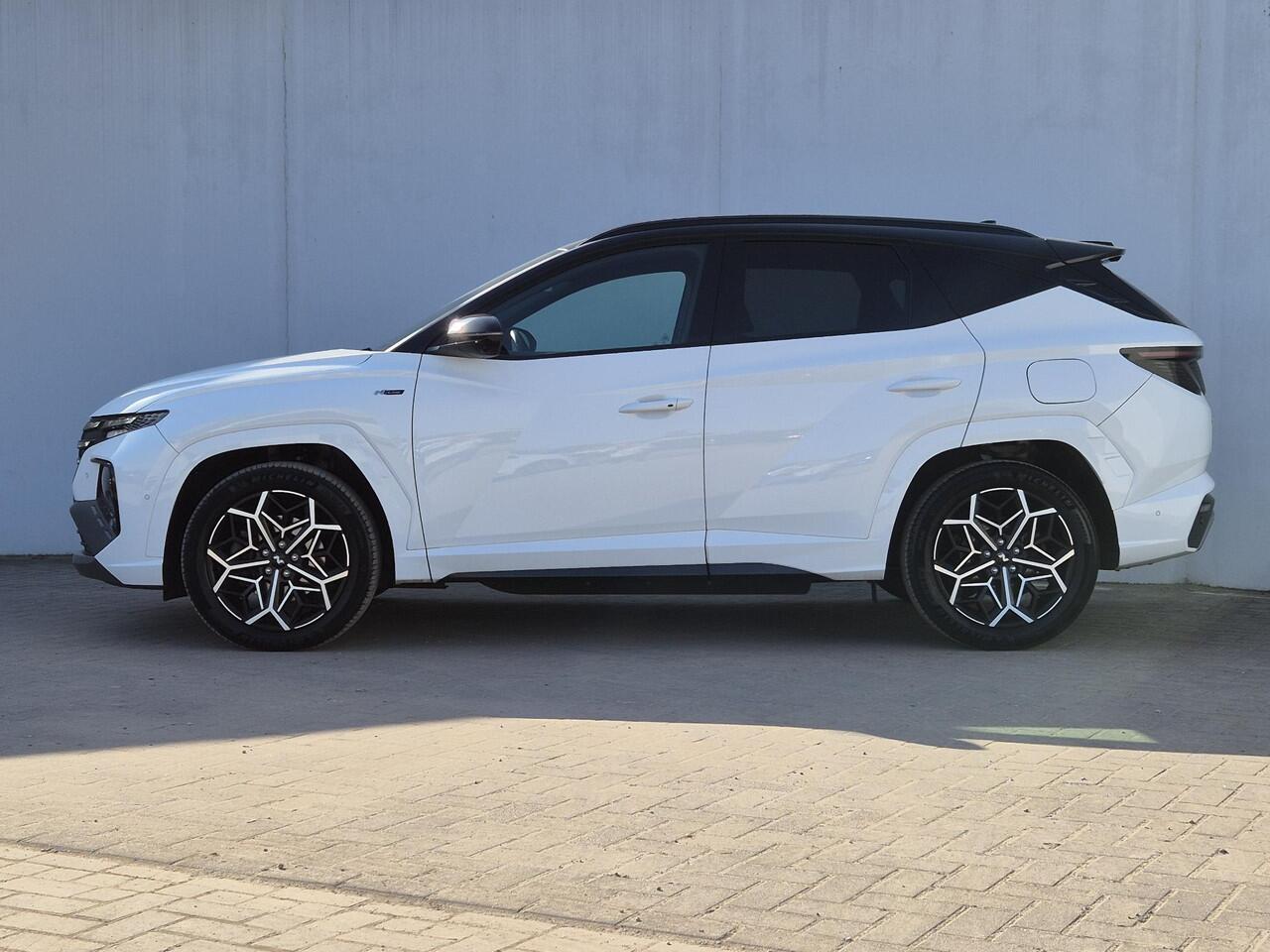 Hyundai TUCSON 1.6 T-GDI PHEV N Line 4WD Automaat / Rondomzicht camera / Apple Carplay Android Auto / Adaptief cruise control / Trekgewicht 1350 Kg / Stuur- en Stoelverwarming / Elektrisch bedienbare stoelen - achterklep /