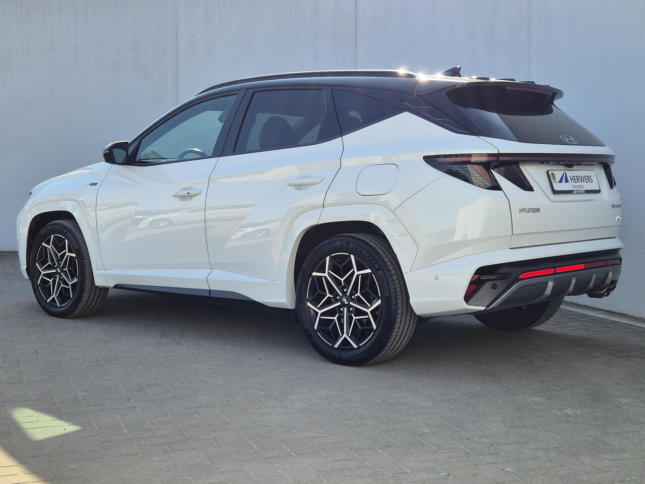 Hyundai TUCSON 1.6 T-GDI PHEV N Line 4WD Automaat / Rondomzicht camera / Apple Carplay Android Auto / Adaptief cruise control / Trekgewicht 1350 Kg / Stuur- en Stoelverwarming / Elektrisch bedienbare stoelen - achterklep /