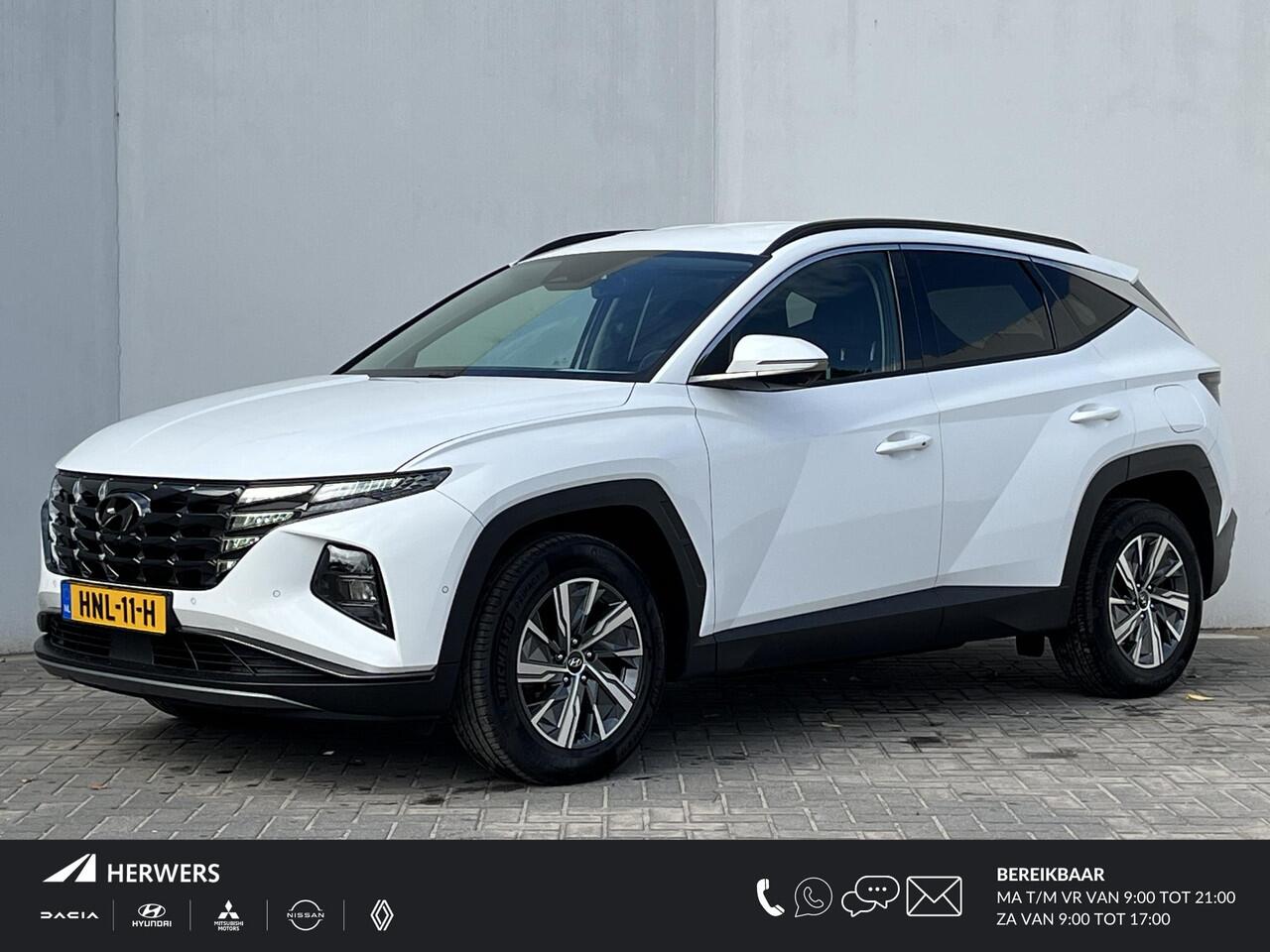 Hyundai TUCSON 1.6 T-GDI HEV 230 PK Premium / Duurste uitvoering / Trekgewicht 1650 kg / Apple Carplay Android Auto / Stuur- en Stoelverwarming / Rondomzicht camera / Climate Control / Stoelventilatie voor /