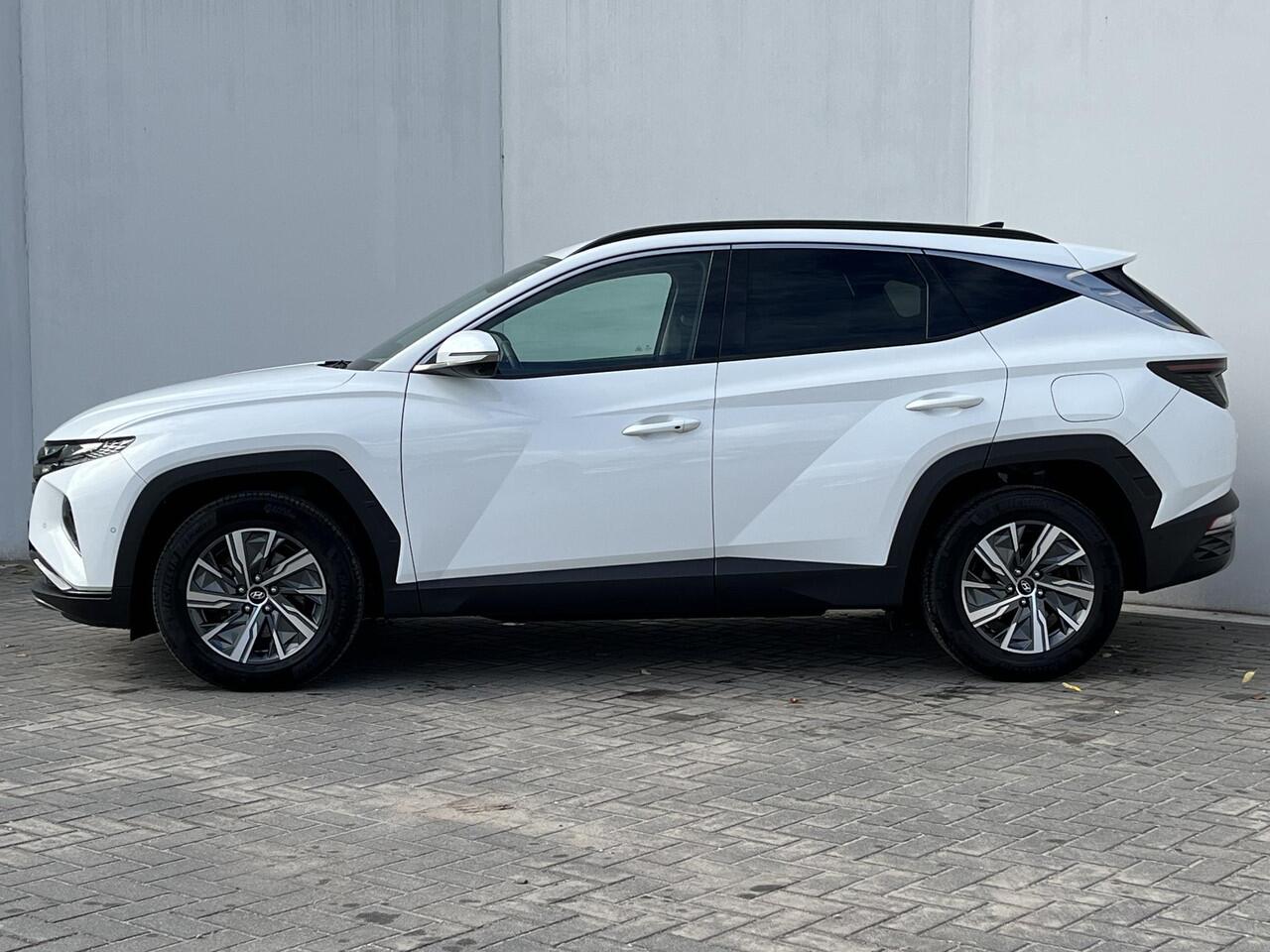 Hyundai TUCSON 1.6 T-GDI HEV 230 PK Premium / Duurste uitvoering / Trekgewicht 1650 kg / Apple Carplay Android Auto / Stuur- en Stoelverwarming / Rondomzicht camera / Climate Control / Stoelventilatie voor /