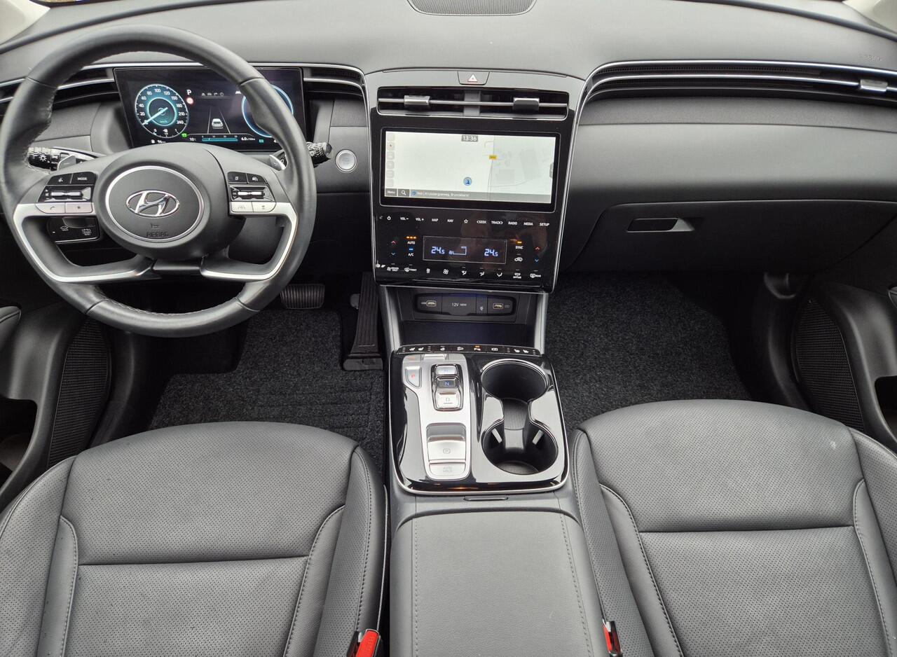 Hyundai TUCSON 1.6 T-GDI HEV 230 PK Premium / Duurste uitvoering / Trekgewicht 1650 kg / Apple Carplay Android Auto / Stuur- en Stoelverwarming / Rondomzicht camera / Climate Control / Stoelventilatie voor /