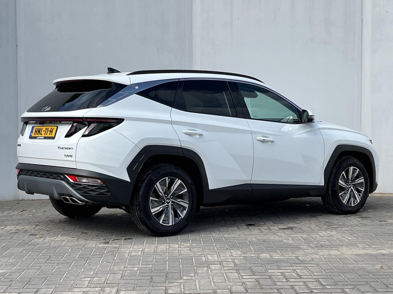 Hyundai TUCSON 1.6 T-GDI HEV 230 PK Premium / Duurste uitvoering / Trekgewicht 1650 kg / Apple Carplay Android Auto / Stuur- en Stoelverwarming / Rondomzicht camera / Climate Control / Stoelventilatie voor /