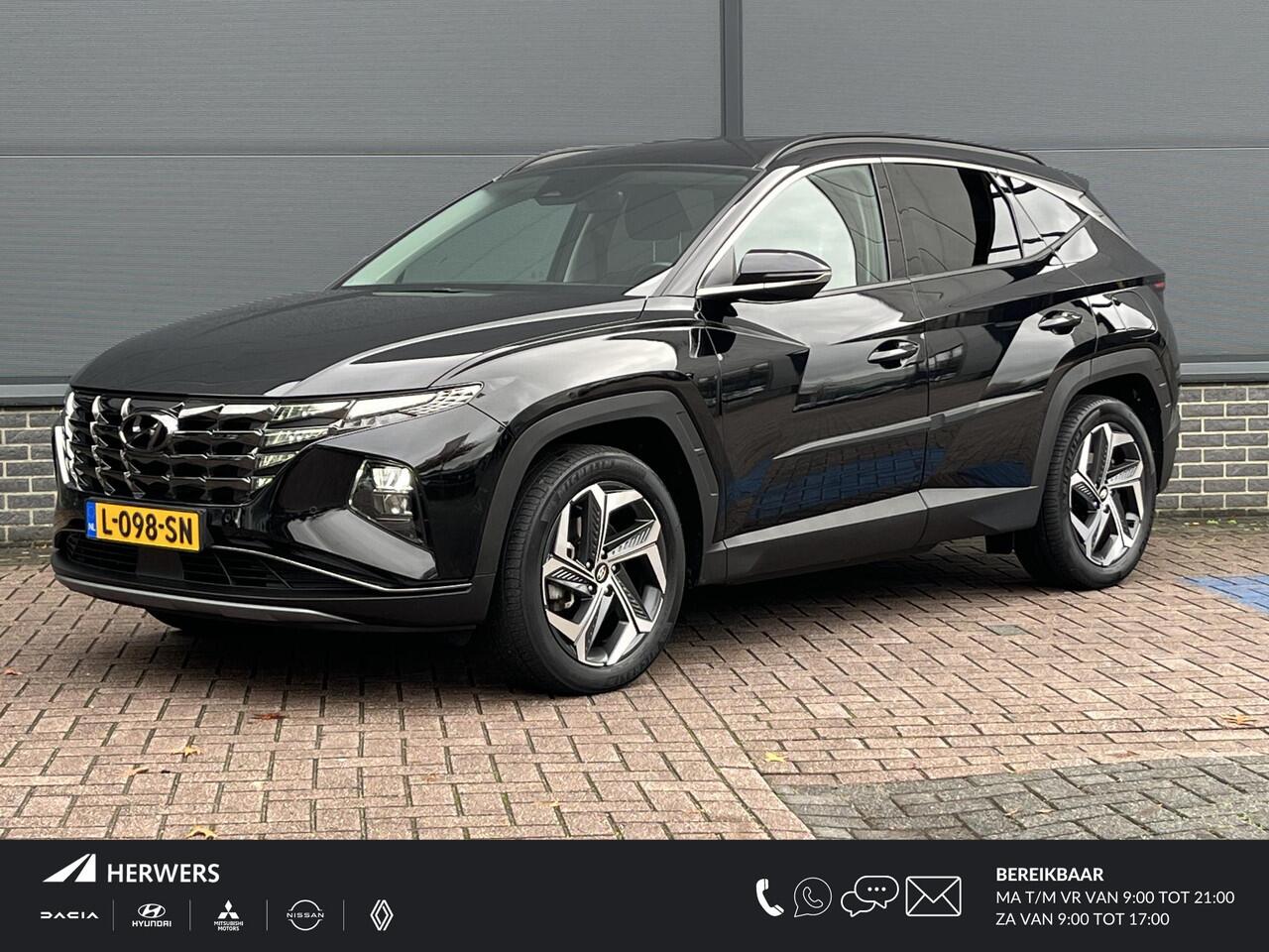Hyundai TUCSON 1.6 T-GDI PHEV Comfort 4WD / Dealer onderhouden / Navigatie / Apple carplay & Android auto / Stoelverwarming / Adaptieve cruise control / Climate control / 19" Licht metalenvelgen /