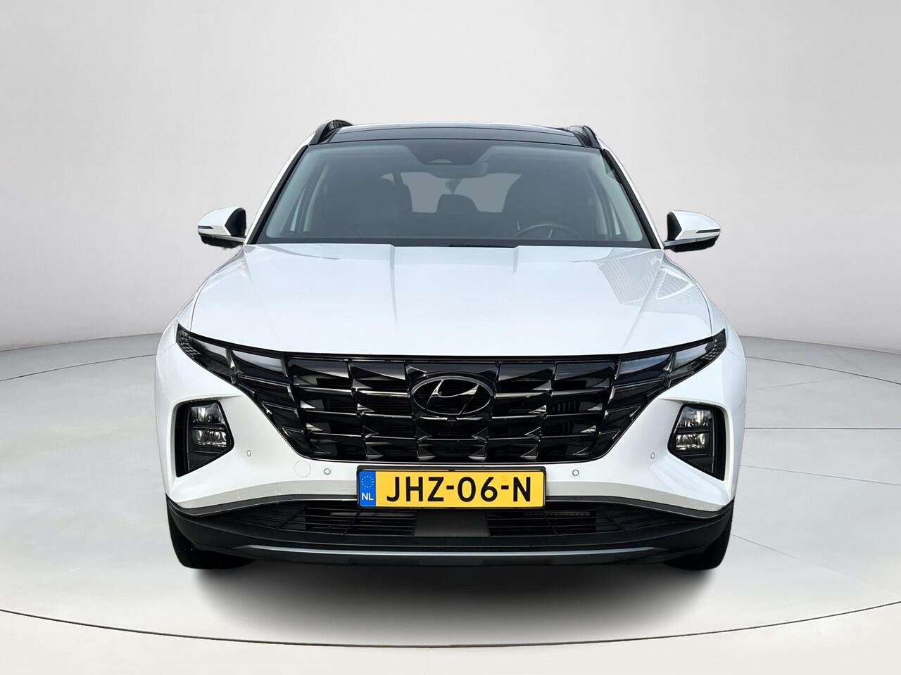 Hyundai TUCSON 1.6 T-GDI PHEV Premium Sky 4WD | Stoelverwarming/verkoeling | Stuurverwarming | Schuif-kantel dak | Lederen bekleding | 2e zit-rij bankverwarming | 360graden camera | 3-zone klimaatcontrole | Elektrische geheugen stoelen | KRELL- premium audiosysteem |