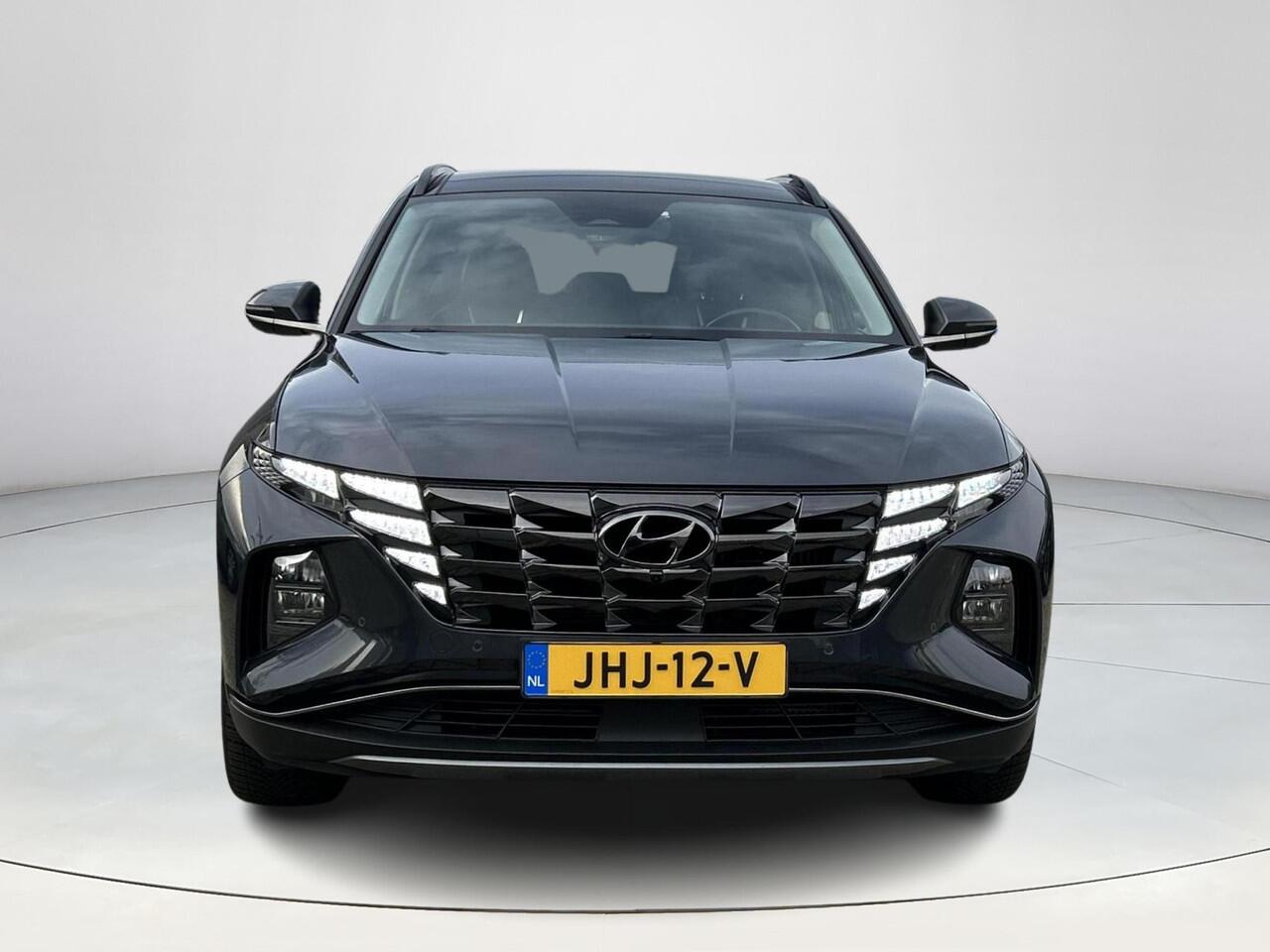 Hyundai TUCSON 1.6 T-GDI HEV Premium Sky | Stuurverwarming | Stoel verwarming/verkoeling | Elektrisch verstelbare stoelen | 360 camera | Lederen bekleding | Navigatie | Krell premium-audiosysteem