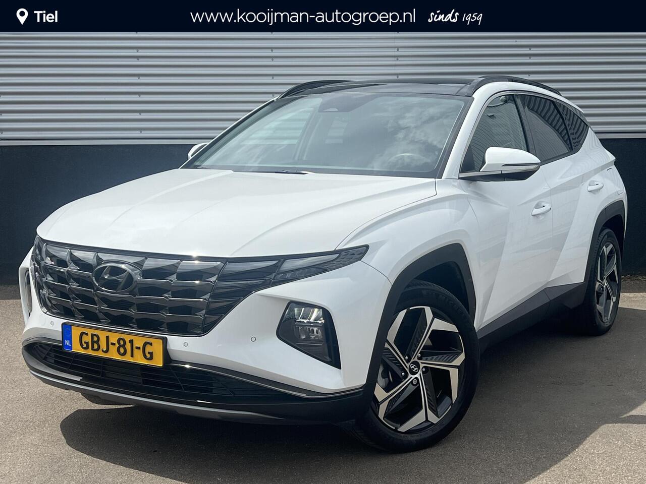 Hyundai TUCSON 1.6 T-GDI PHEV Premium Edition Sky 4WD 4WD Schuif/kanteldak, Navigatie, Stoelverwarming, Parkeersensoren voor + Achter, Dodehoekdetectie, Climate control, BTW-Auto