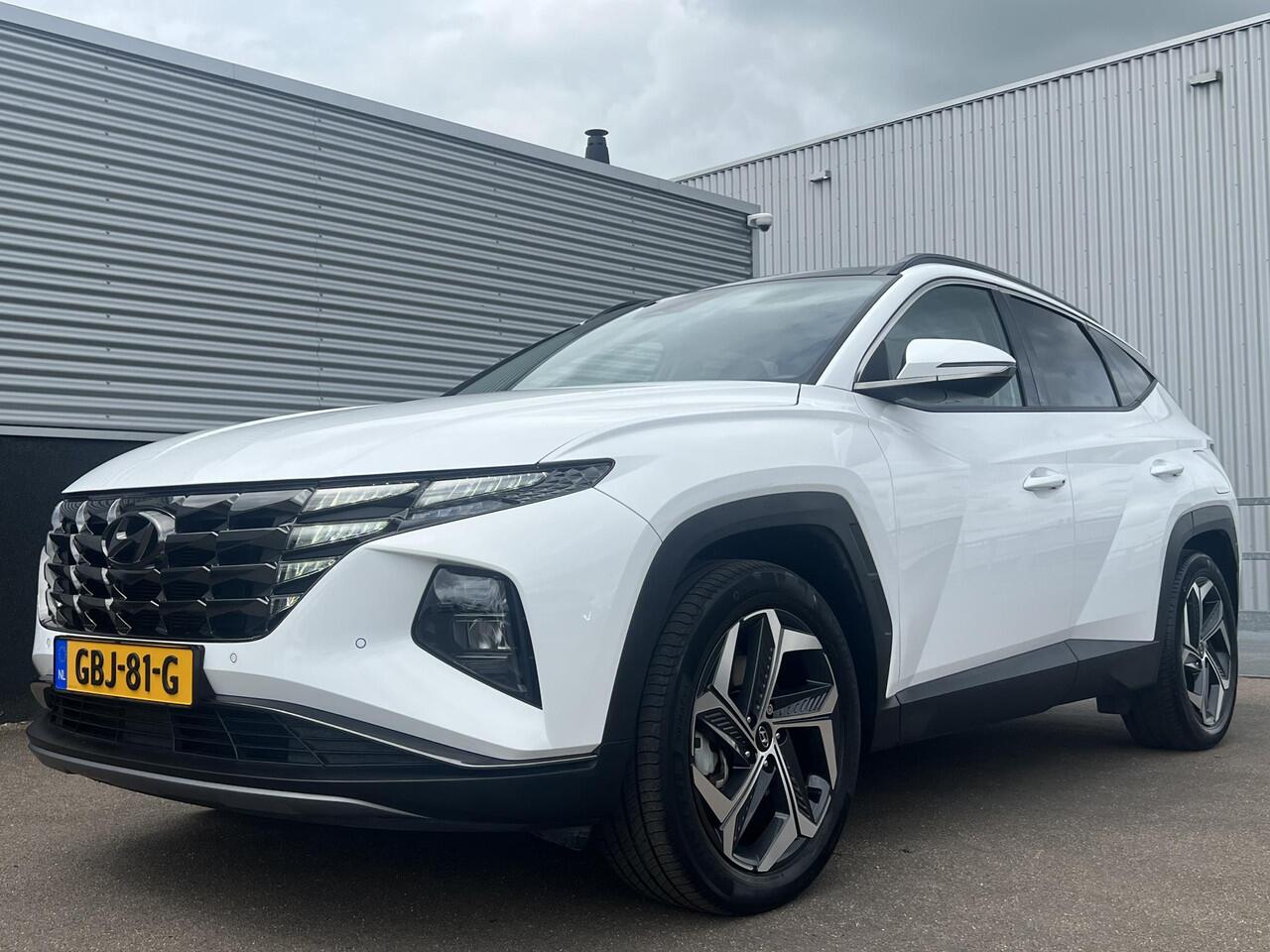Hyundai TUCSON 1.6 T-GDI PHEV Premium Edition Sky 4WD 4WD Schuif/kanteldak, Navigatie, Stoelverwarming, Parkeersensoren voor + Achter, Dodehoekdetectie, Climate control, BTW-Auto