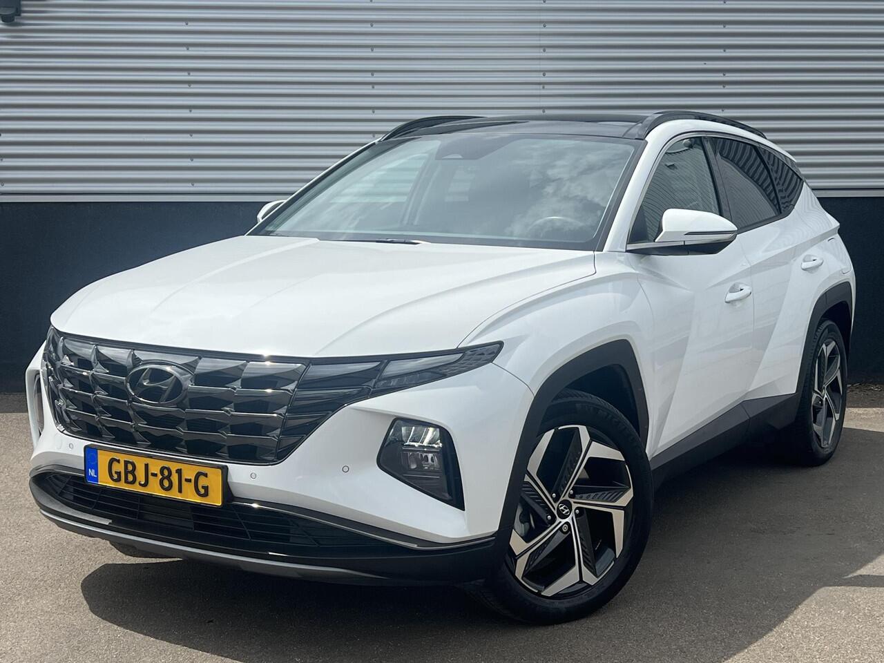 Hyundai TUCSON 1.6 T-GDI PHEV Premium Edition Sky 4WD 4WD Schuif/kanteldak, Navigatie, Stoelverwarming, Parkeersensoren voor + Achter, Dodehoekdetectie, Climate control, BTW-Auto
