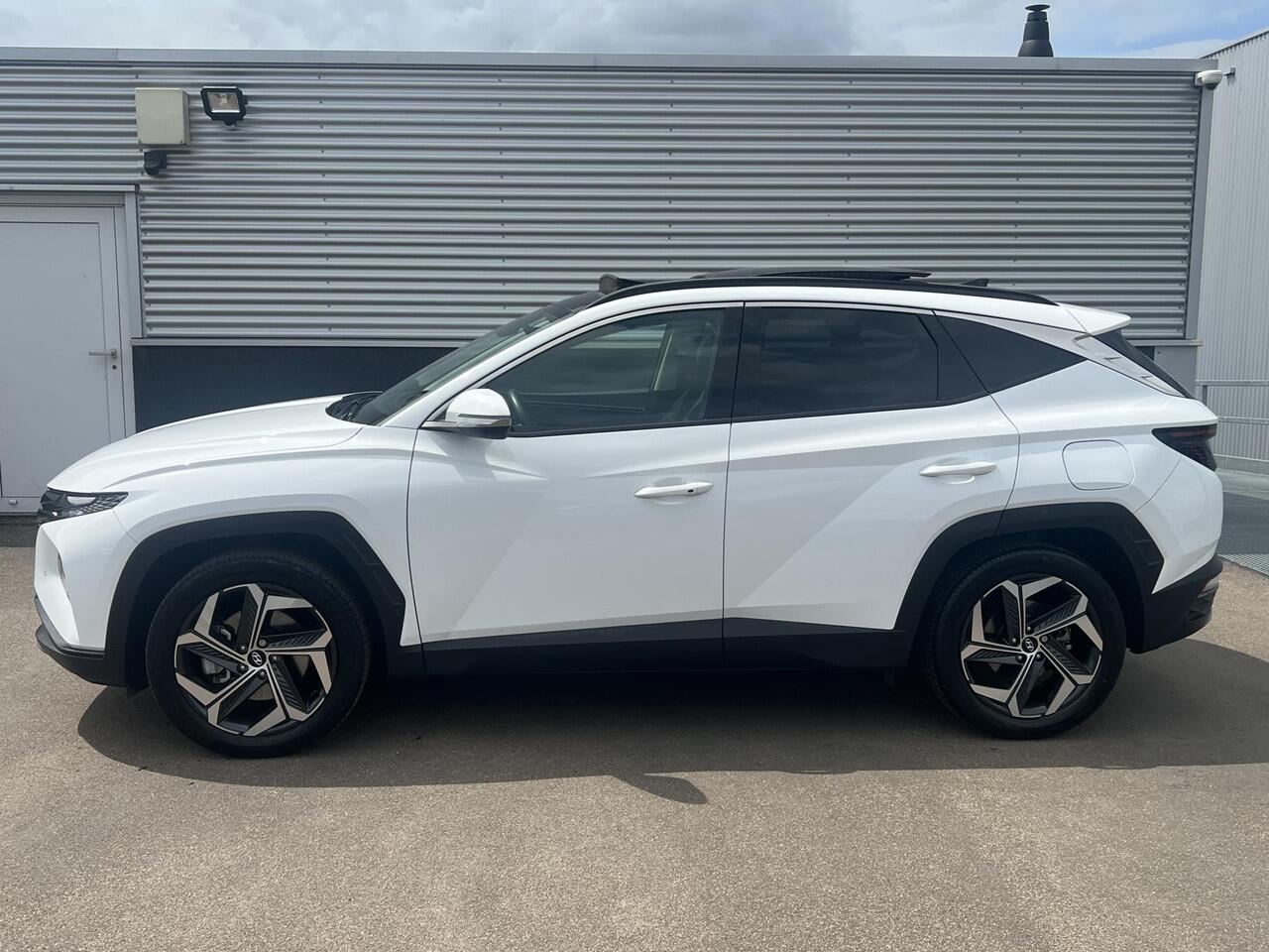 Hyundai TUCSON 1.6 T-GDI PHEV Premium Edition Sky 4WD 4WD Schuif/kanteldak, Navigatie, Stoelverwarming, Parkeersensoren voor + Achter, Dodehoekdetectie, Climate control, BTW-Auto