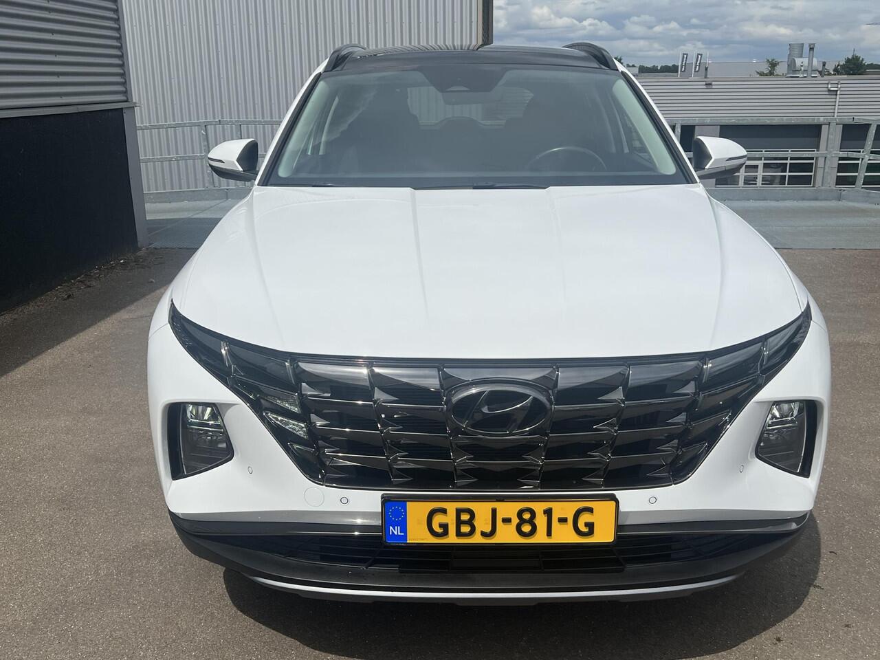 Hyundai TUCSON 1.6 T-GDI PHEV Premium Edition Sky 4WD 4WD Schuif/kanteldak, Navigatie, Stoelverwarming, Parkeersensoren voor + Achter, Dodehoekdetectie, Climate control, BTW-Auto