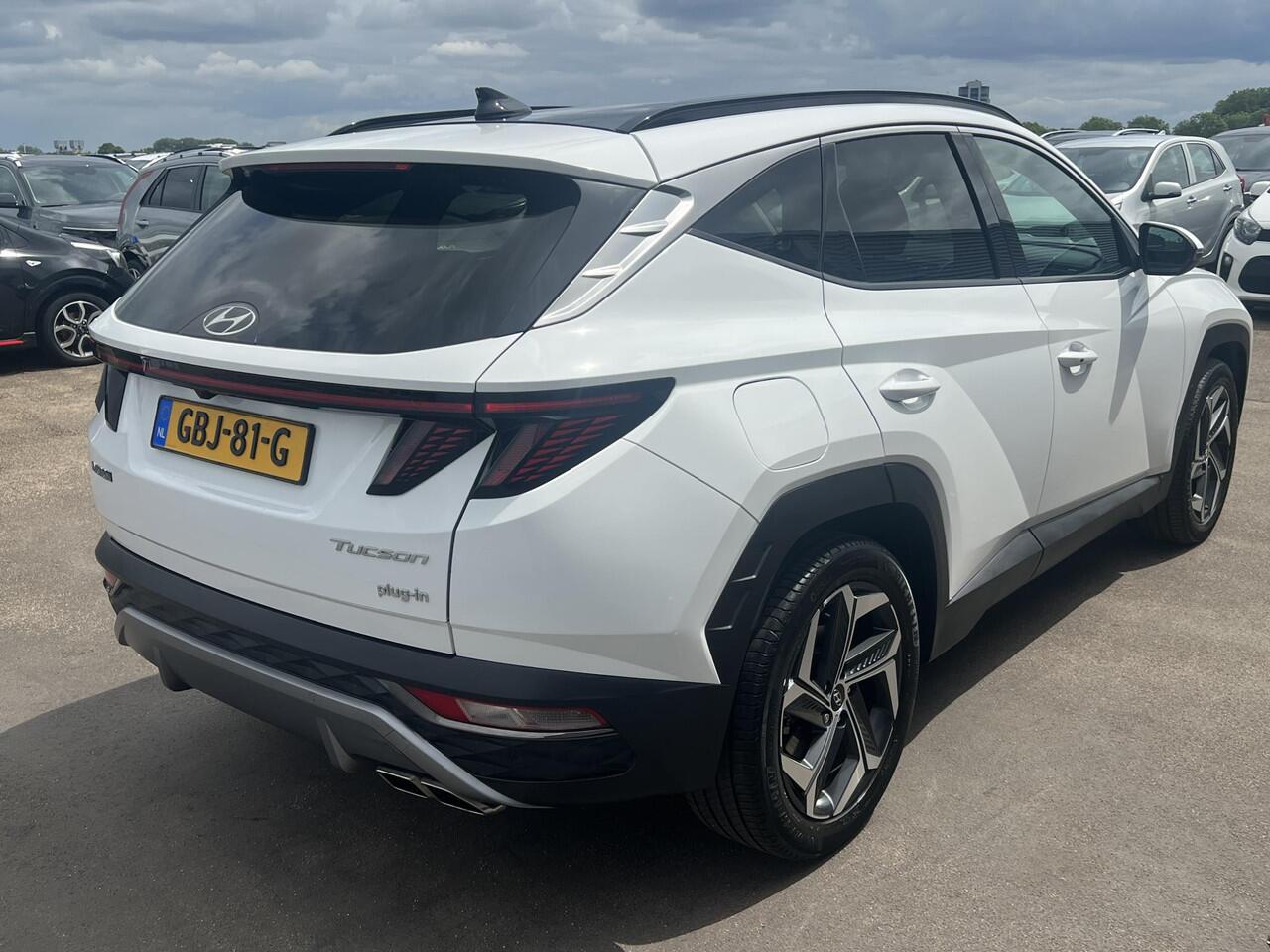 Hyundai TUCSON 1.6 T-GDI PHEV Premium Edition Sky 4WD 4WD Schuif/kanteldak, Navigatie, Stoelverwarming, Parkeersensoren voor + Achter, Dodehoekdetectie, Climate control, BTW-Auto