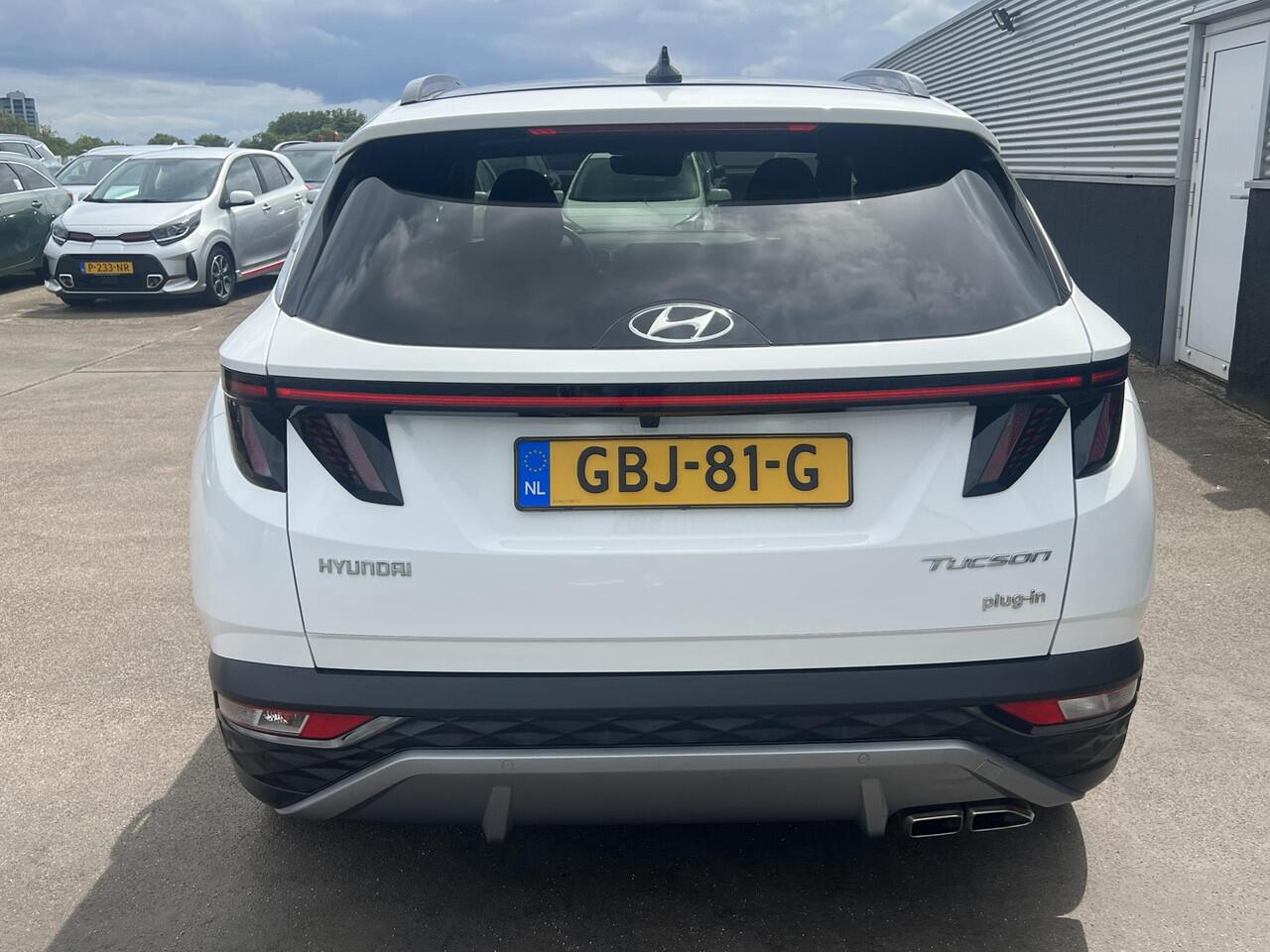 Hyundai TUCSON 1.6 T-GDI PHEV Premium Edition Sky 4WD 4WD Schuif/kanteldak, Navigatie, Stoelverwarming, Parkeersensoren voor + Achter, Dodehoekdetectie, Climate control, BTW-Auto