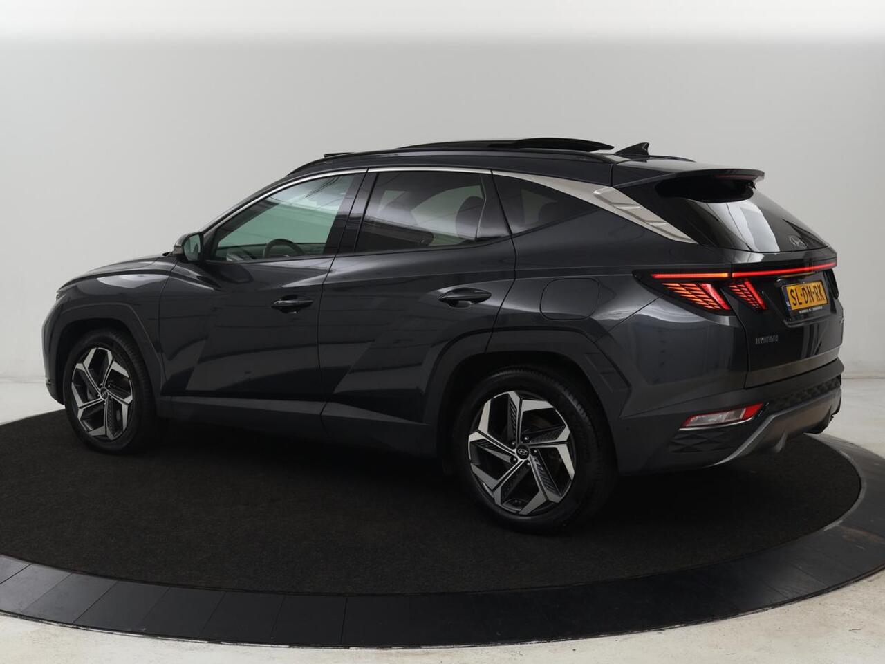 Hyundai TUCSON 1.6 T-GDI PHEV Premium Sky 4WD | Panoramadak | Stoelventilatie | Leder | 360 Camera | Adaptive cruise | Memory | Achterbankverwarming | Carplay | Full LED | Navigatie | Plug In