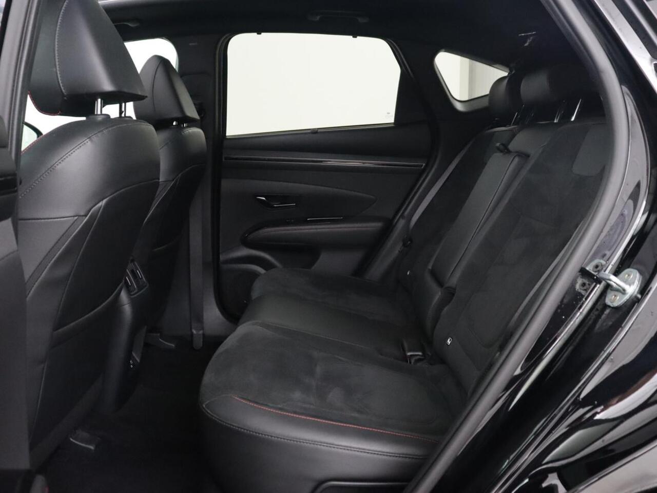 Hyundai TUCSON 1.6 T-GDI PHEV N Line Sky 4WD | Panoramadak | Stoelverwarming | Leder/Alcantara | Camera | Adaptive cruise | Carplay | Full LED | Stuurverwarming | Keyless | Plug In