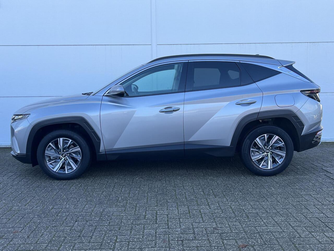 Hyundai TUCSON 1.6 T-GDI HEV Comfort / airco (automatisch)/ Apple Carplay/Android Auto / cruise control adaptief met Stop&Go / navigatiesysteem full map /