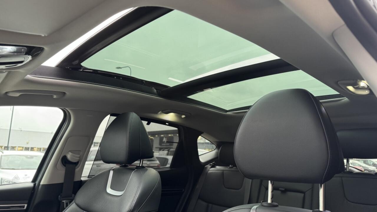 Hyundai TUCSON 1.6 T-GDI HEV Prem | Pano | Leer | Camera