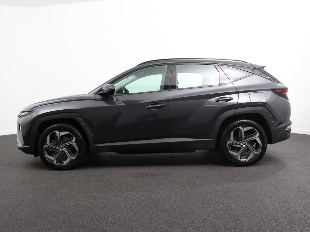 Hyundai TUCSON 1.6 T-GDI PHEV Comfort 4WD Climate control Cruise control Parkeersensoren achter Achteruitrij camera Navigatie LED Apple Carplay/ Android Auto