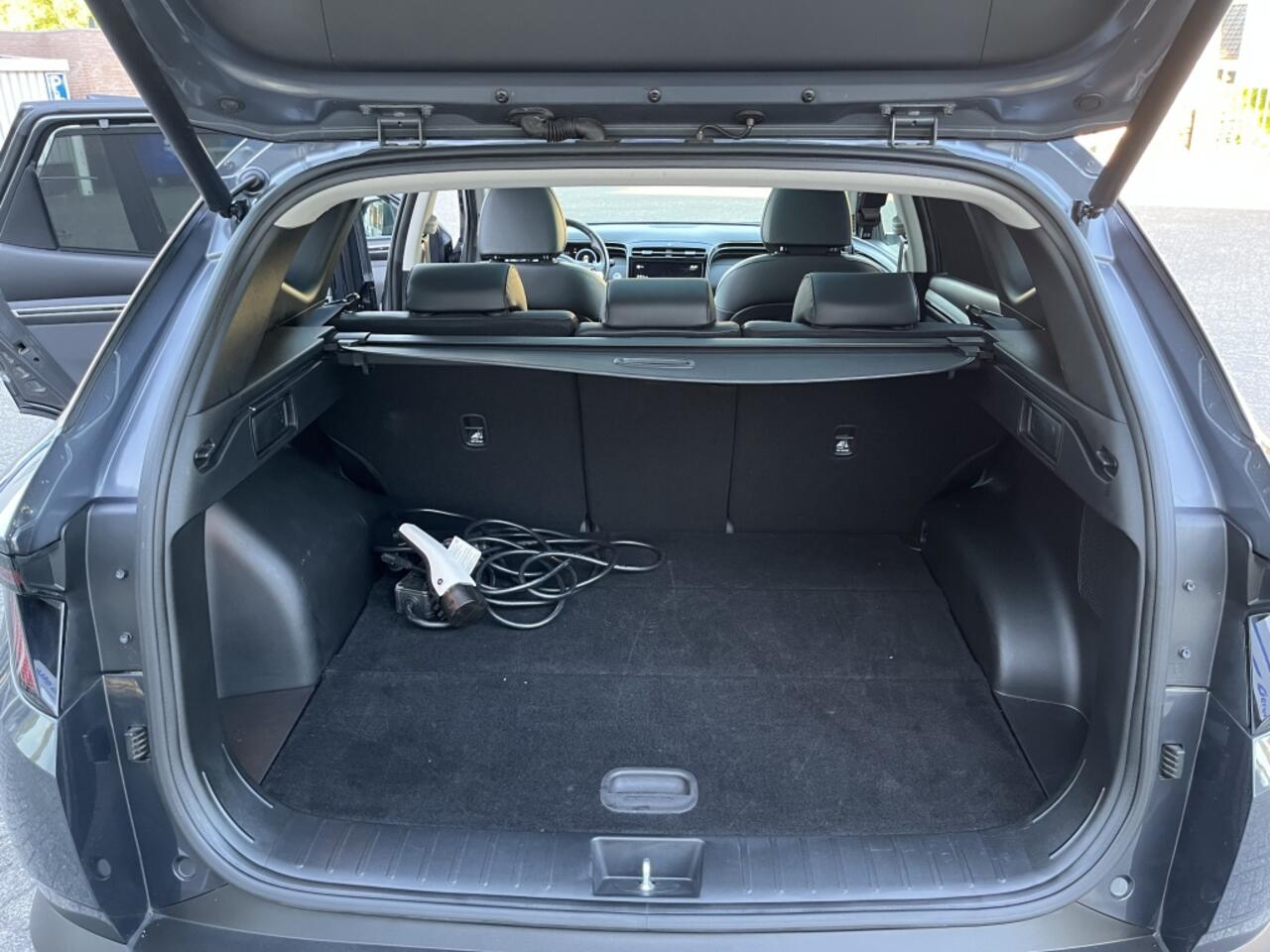 Hyundai TUCSON 1.6 T-GDI PHEV Premium Sky 4WD | Panorama dak | Camera | 1350kg