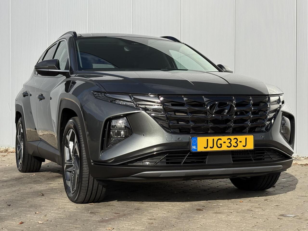 Hyundai TUCSON 1.6 T-GDI PHEV Premium Sky 4WD Automaat / Dealer onderhouden / Afneembare trekhaak (1.350 kg) / Panoramadak / 360° camera / Krell Audio / Stuur,- achterbank,- en voorstoelverwarming / Geventileerde voorstoelen / Android Auto / Apple Carplay