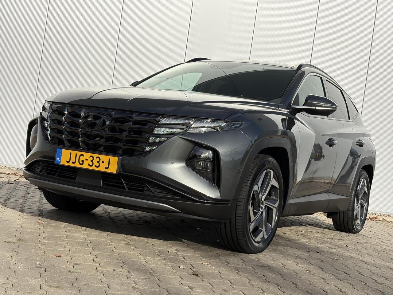 Hyundai TUCSON 1.6 T-GDI PHEV Premium Sky 4WD Automaat / Dealer onderhouden / Afneembare trekhaak (1.350 kg) / Panoramadak / 360° camera / Krell Audio / Stuur,- achterbank,- en voorstoelverwarming / Geventileerde voorstoelen / Android Auto / Apple Carplay