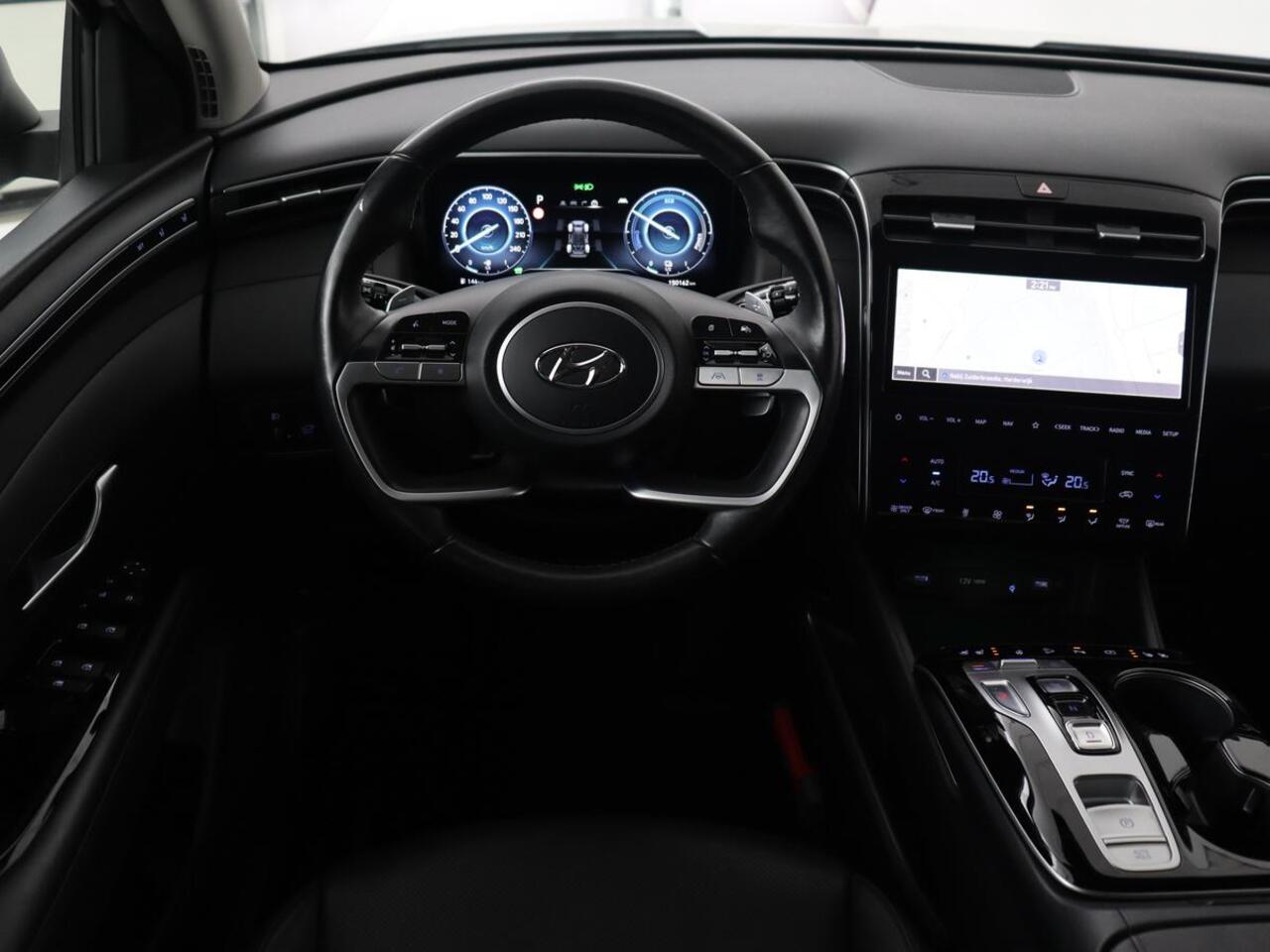 Hyundai TUCSON 1.6 T-GDI PHEV Premium 4WD | Trekhaak | Stoelventilatie | 360 Camera | Leder | Carplay | Memory | Achterbankverwarming | Navigatie | Stuurverwarming | Full LED | Keyless | Plug In