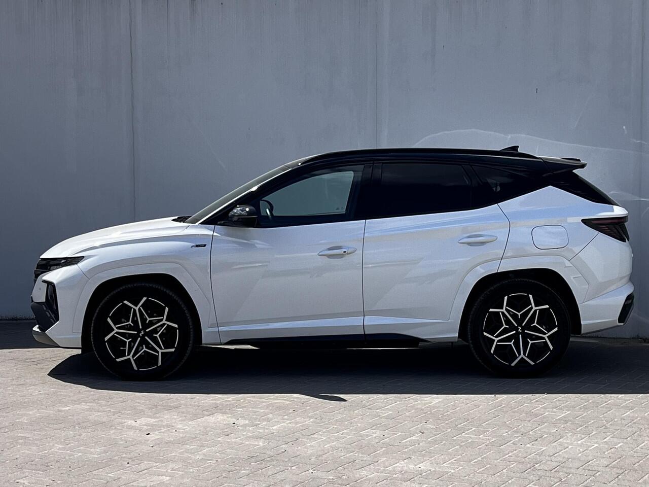 Hyundai TUCSON 1.6 T-GDI PHEV N Line Edition 265PK 4WD Automaat / Dealer onderhouden / SoH 100 % / Trekgewicht 1.350 kg/ Camera / Apple Carplay Android Auto / Adaptief CC / Stuur- en Stoelverwarming / Elektrische klep /